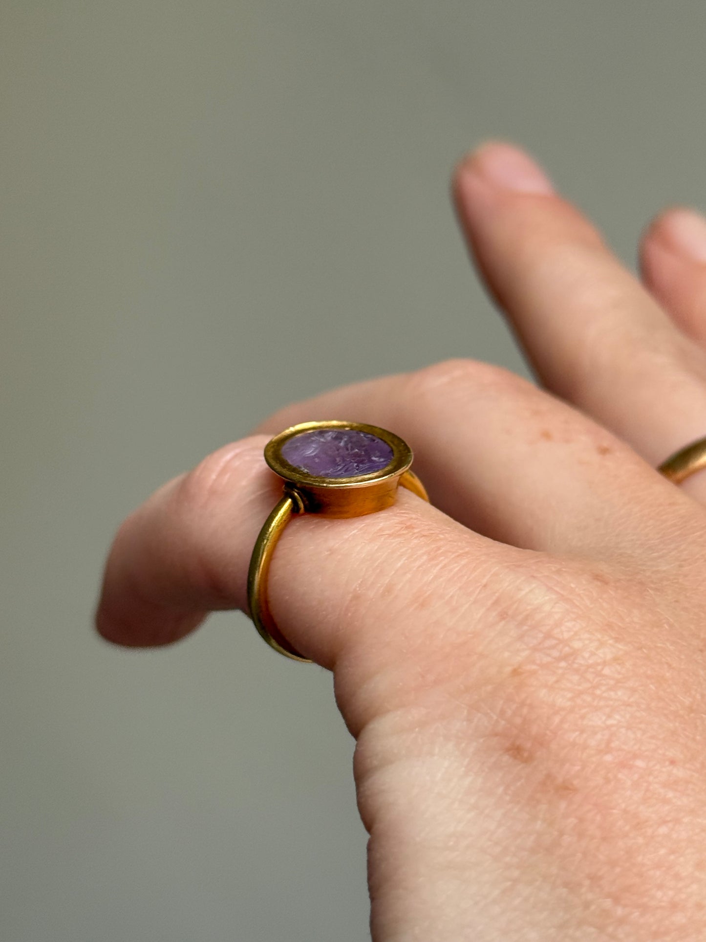 Roman Amethyst Intaglio Ring in 18 Carat Gold; Circa 1800