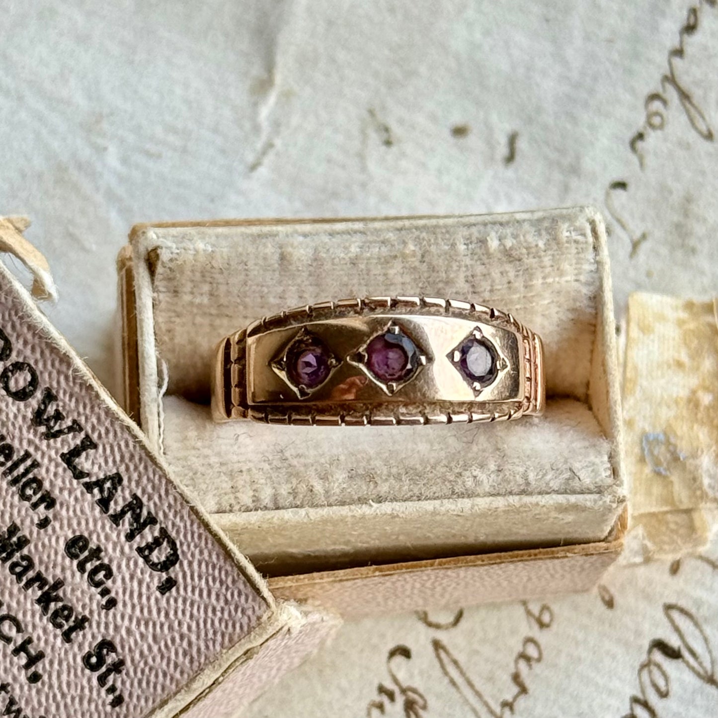 Victorian Amethyst Trilogy Ring in 9 Carat Gold; Circa 1896