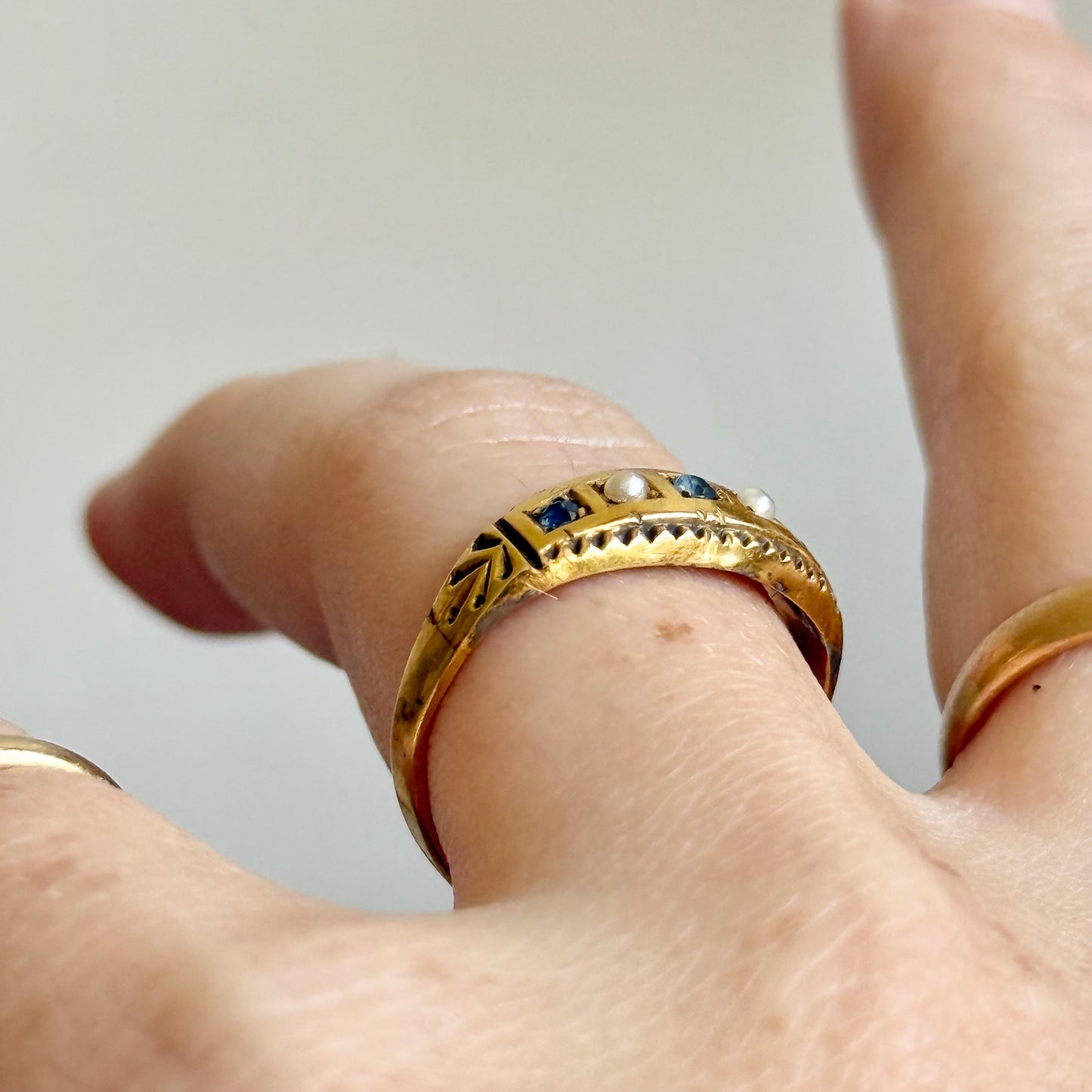 Antique Sapphire & Pearl Ring in 9 Carat Gold; Circa 1900