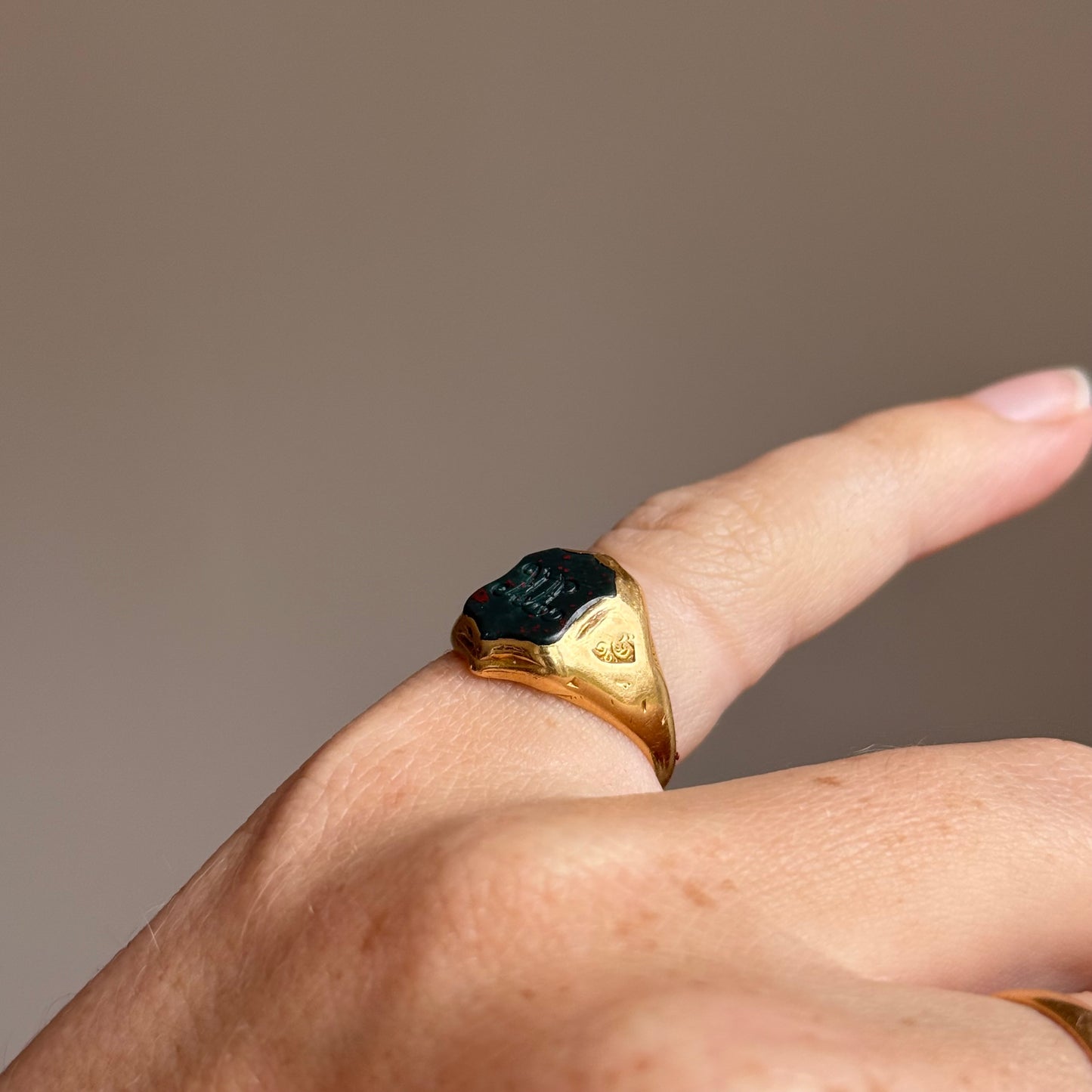 Victorian Bloodstone Intaglio Signet Ring in 18 Carat Gold; Circa 1880