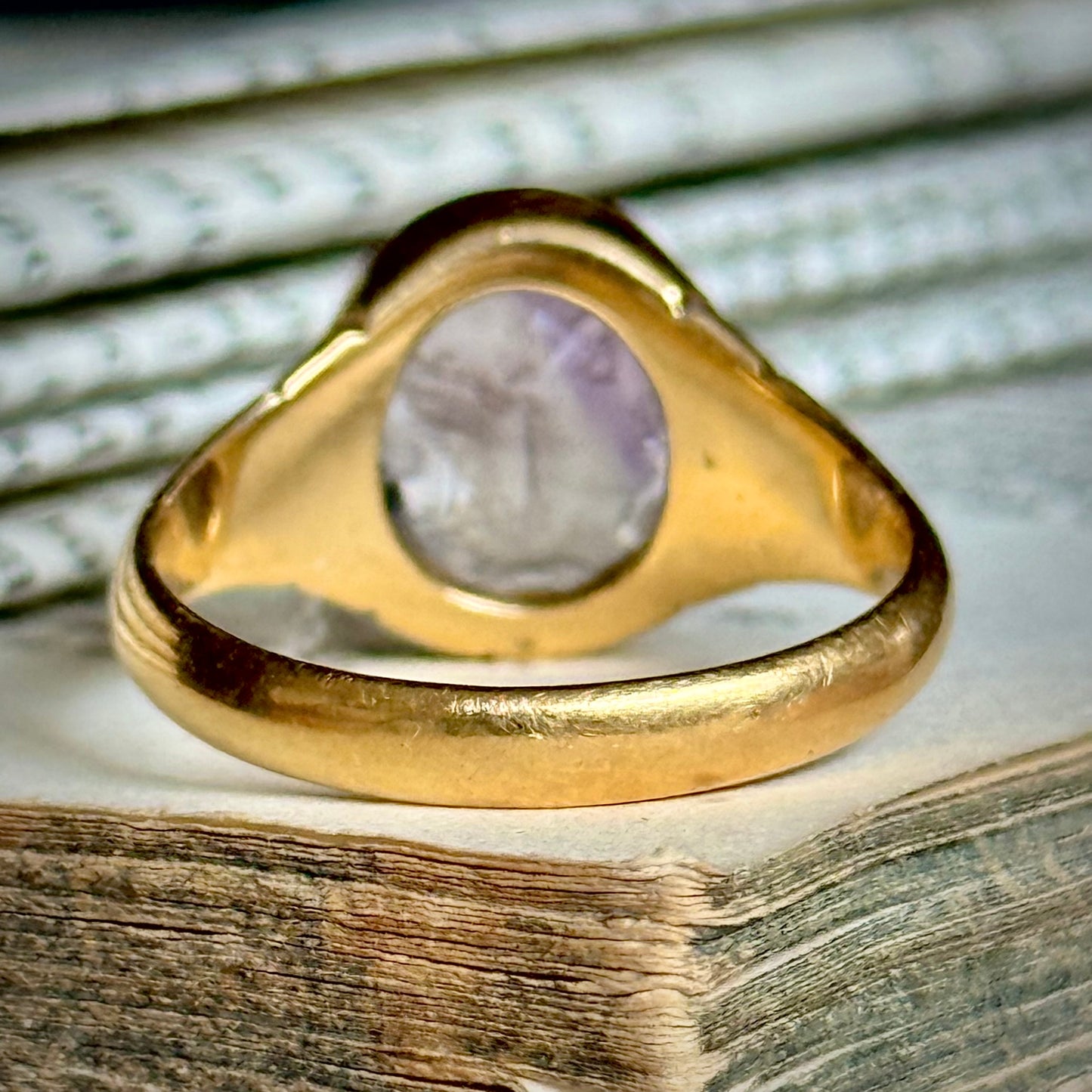 Antique Amethyst Intaglio Ring in 18 Carat Gold; Circa 1900