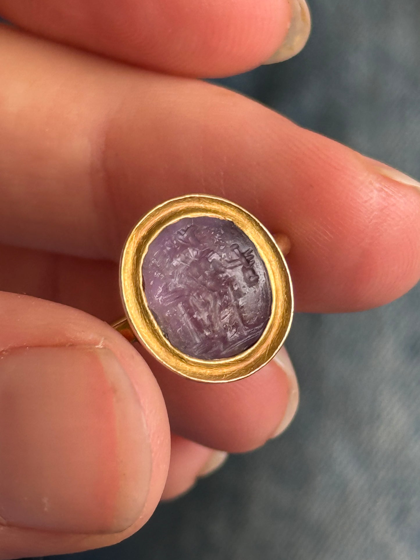 Roman Amethyst Intaglio Ring in 18 Carat Gold; Circa 1800