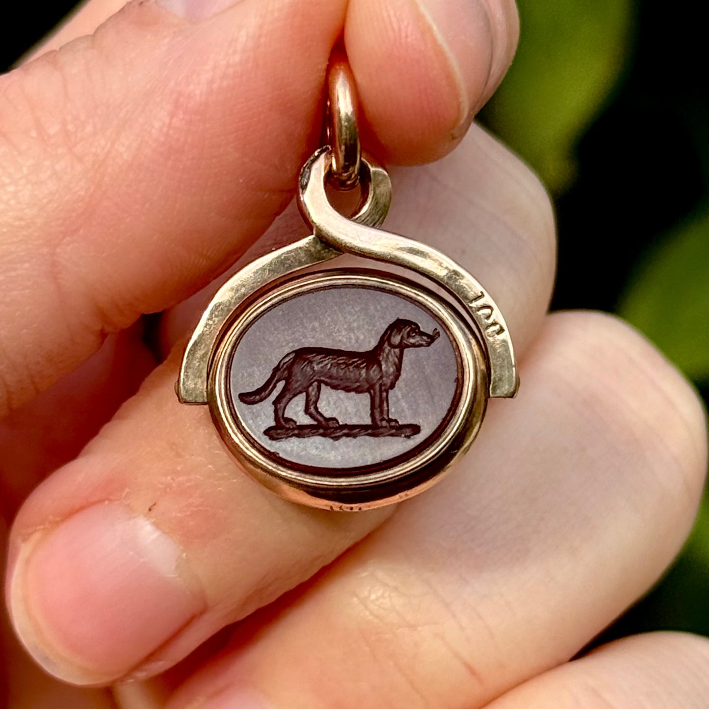 Antique Swivel Intaglio Dog Pendant in 10 Carat Gold; Circa 1900