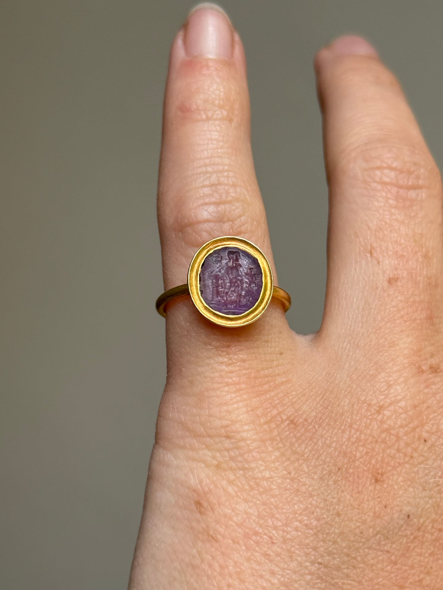 Roman Amethyst Intaglio Ring in 18 Carat Gold; Circa 1800