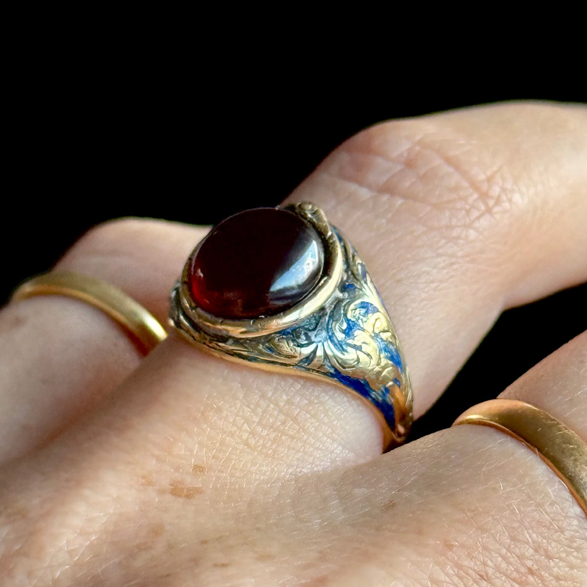 Antique Garnet Ouroboros Signet Ring in 9 Carat Gold; Circa 1870