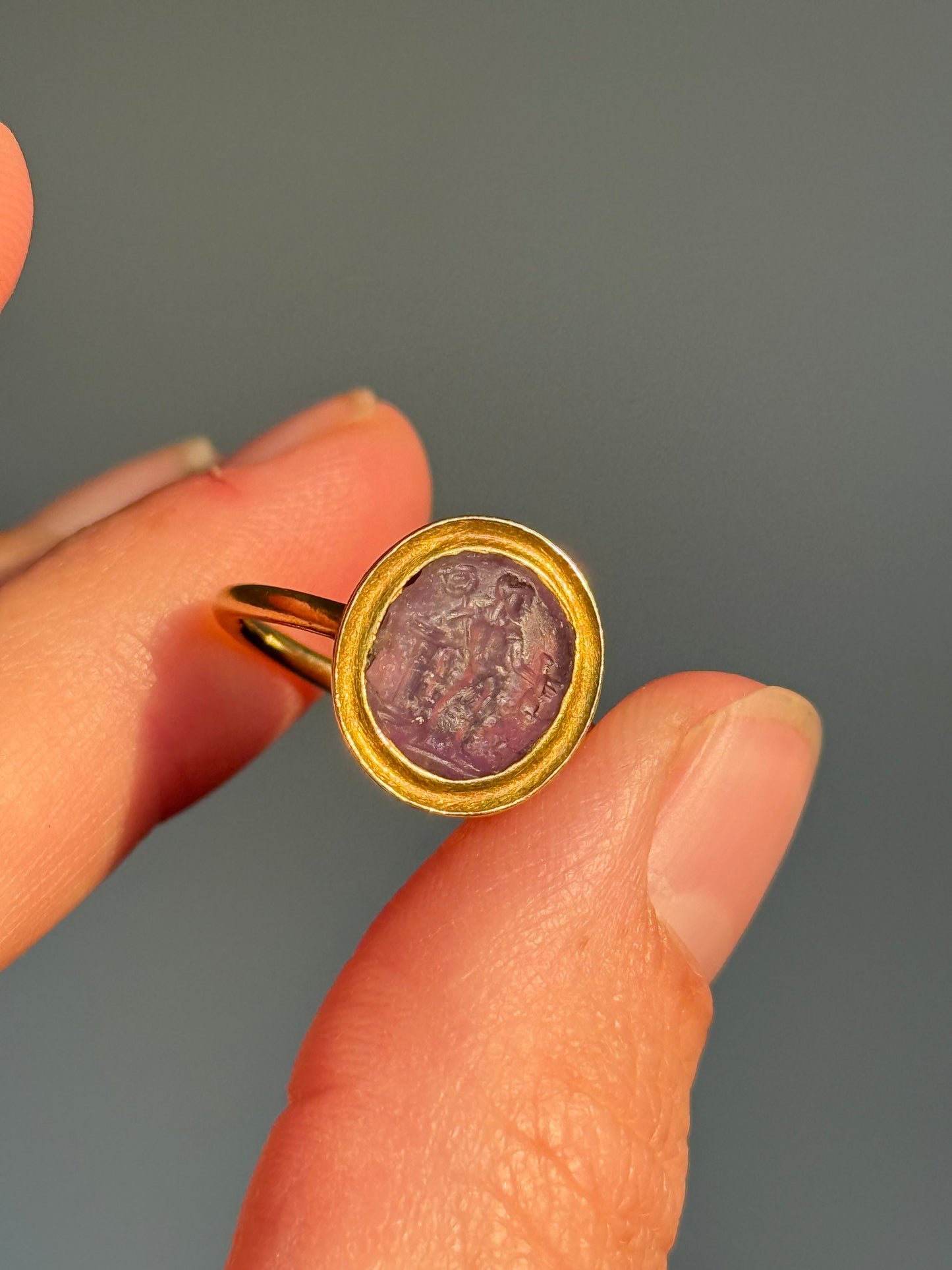 Roman Amethyst Intaglio Ring in 18 Carat Gold; Circa 1800