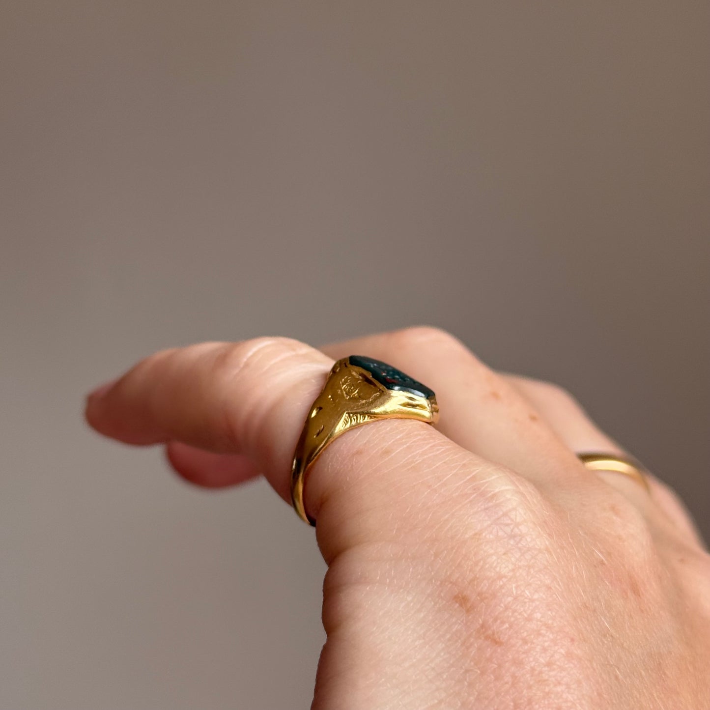 Victorian Bloodstone Intaglio Signet Ring in 18 Carat Gold; Circa 1880