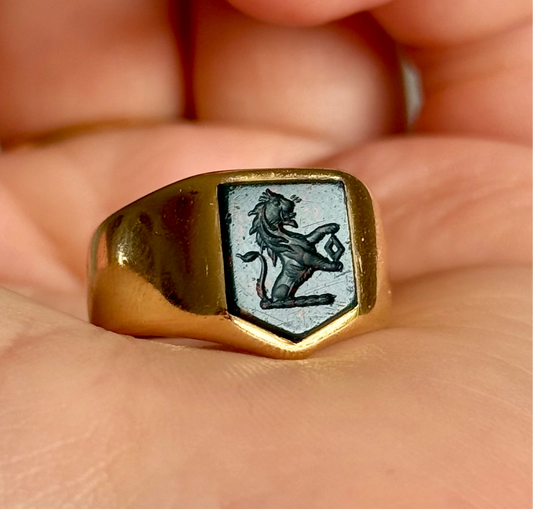 Antique Bloodstone Lion Signet Ring in 18 Carat Gold; Circa 1880