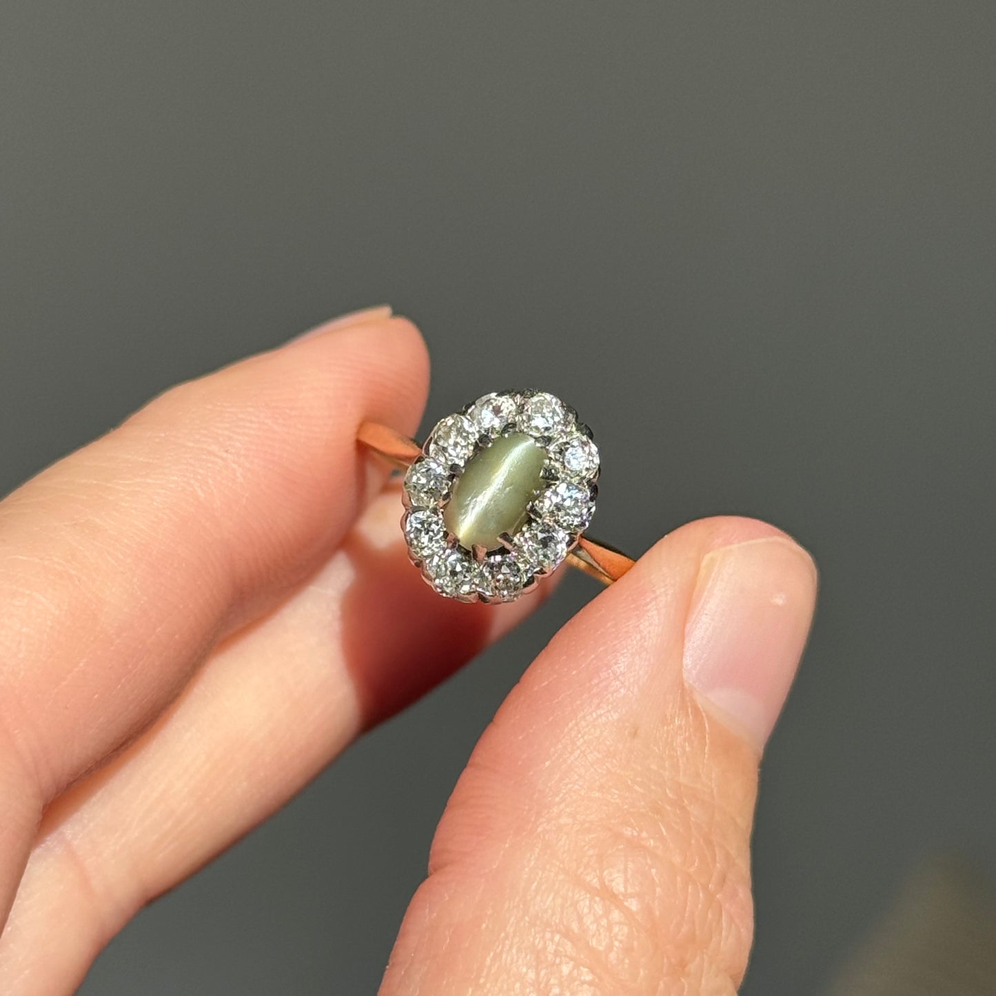 Antique Cat’s Eye Chrysoberyl & Diamond Halo Ring in 18 Carat Gold