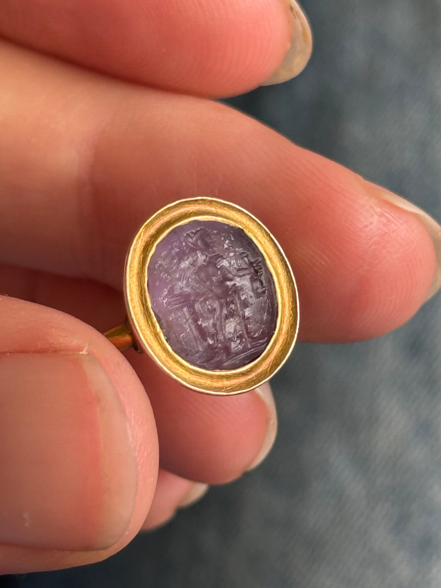 Roman Amethyst Intaglio Ring in 18 Carat Gold; Circa 1800