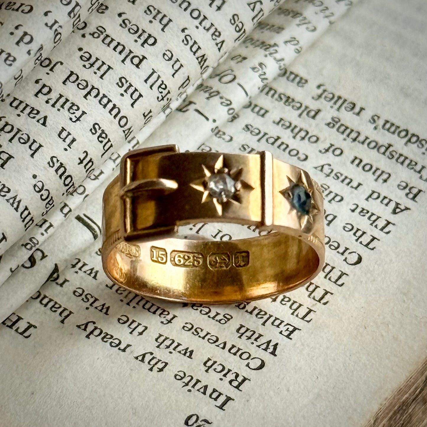 Victorian Buckle Diamond Ring in 15 Carat Gold; Circa 1891