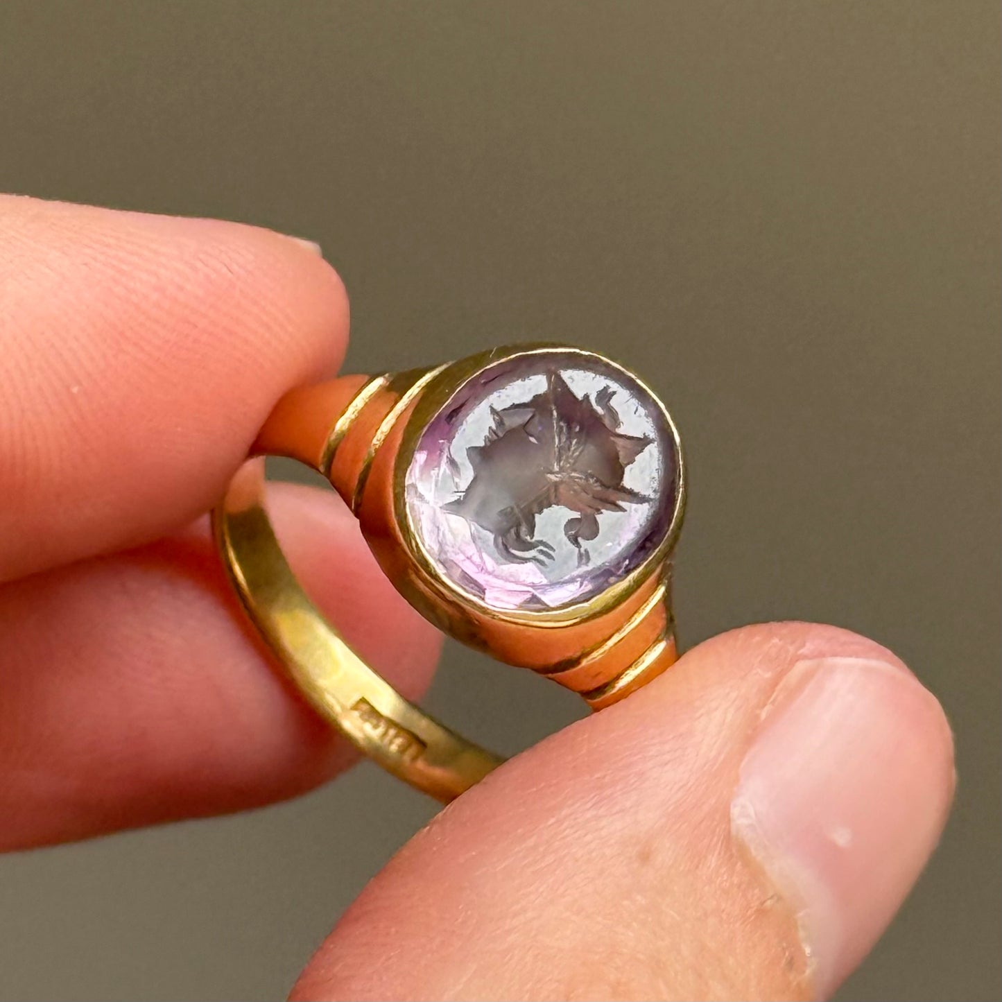 Antique Amethyst Intaglio Ring in 18 Carat Gold; Circa 1900