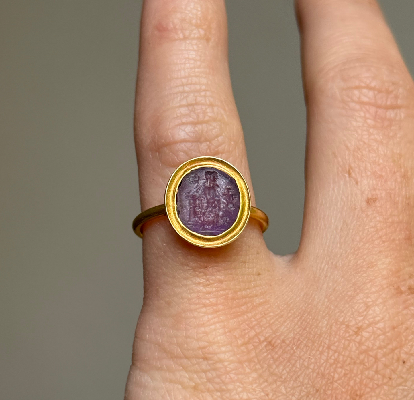 Roman Amethyst Intaglio Ring in 18 Carat Gold; Circa 1800