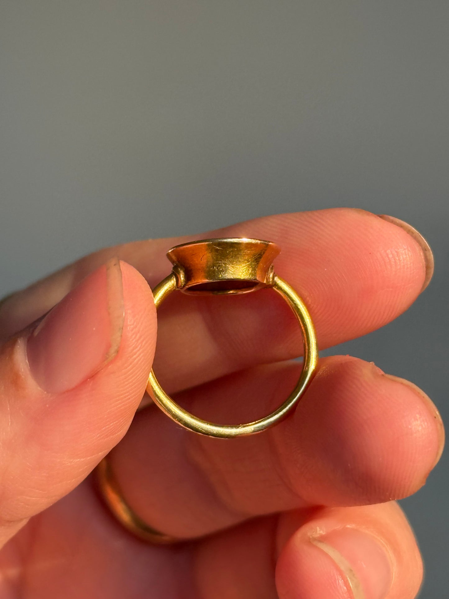 Roman Amethyst Intaglio Ring in 18 Carat Gold; Circa 1800