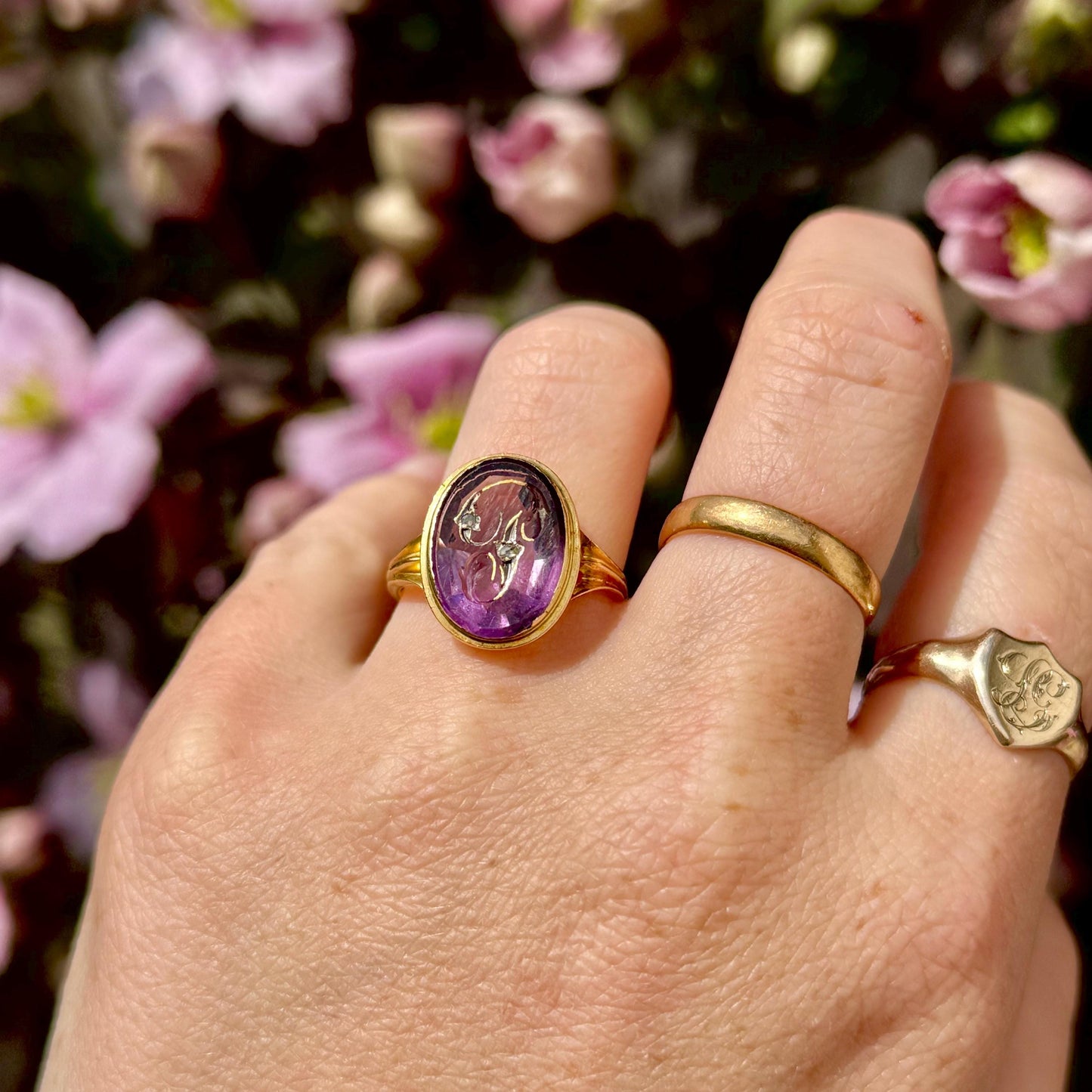 Antique Amethyst 'P' Intaglio Ring in 18 Carat Gold; circa 1860