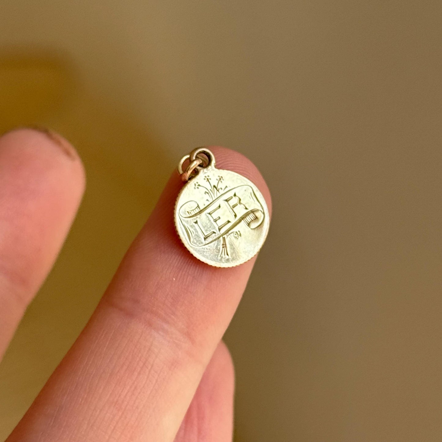 Victorian Love Token ‘LER & 'O' Coin Charm in 9 Carat Gold; Circa 1897