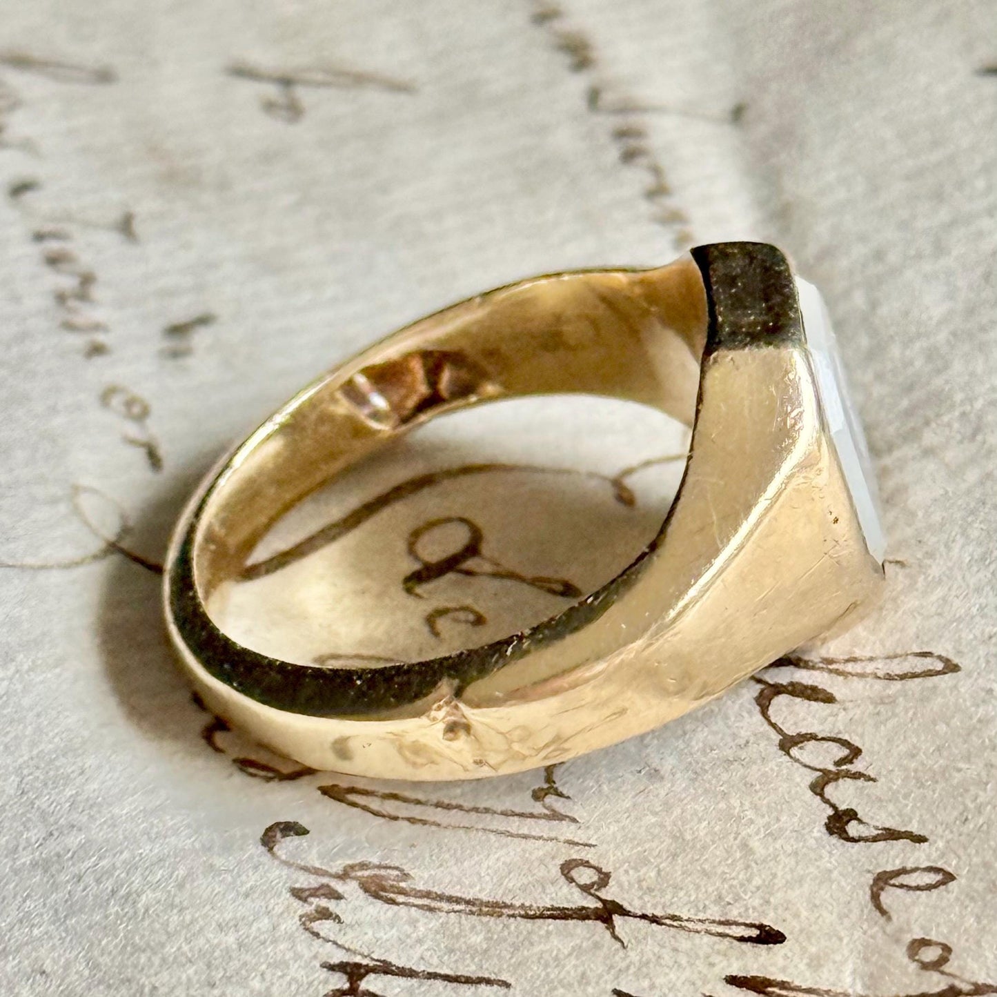 Victorian Chalcedony Monogram 'J or L Intaglio Signet Ring in 9 Carat Gold; Circa 1880