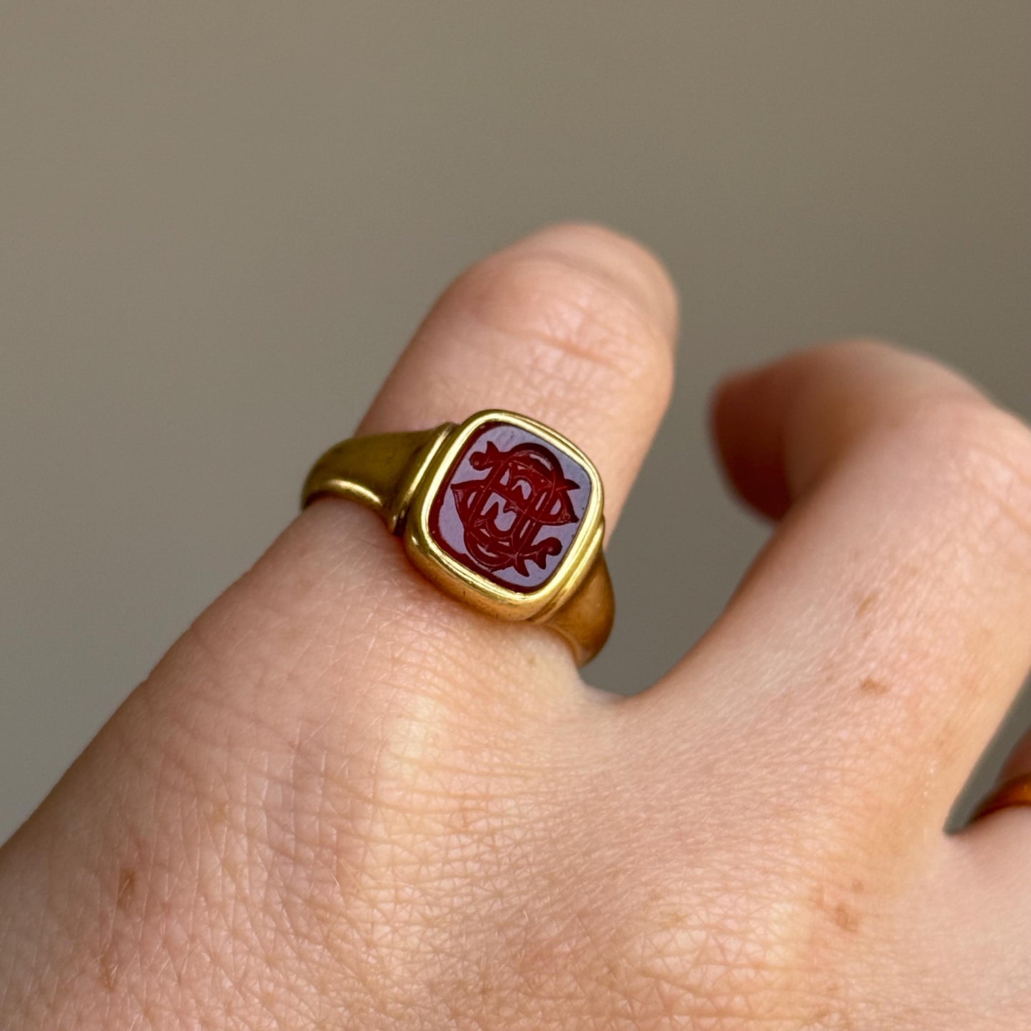 Carnelian Monogram Intaglio Signet Ring in 18 Carat Rose Gold; Circa 1908