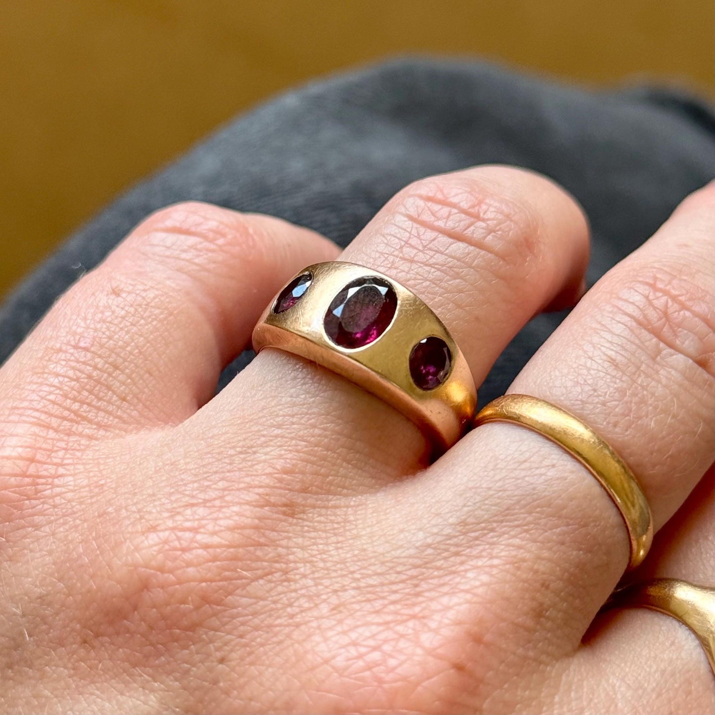 Antique Garnet Trilogy in 9 Carat Rose Gold Ring; Circa 1898