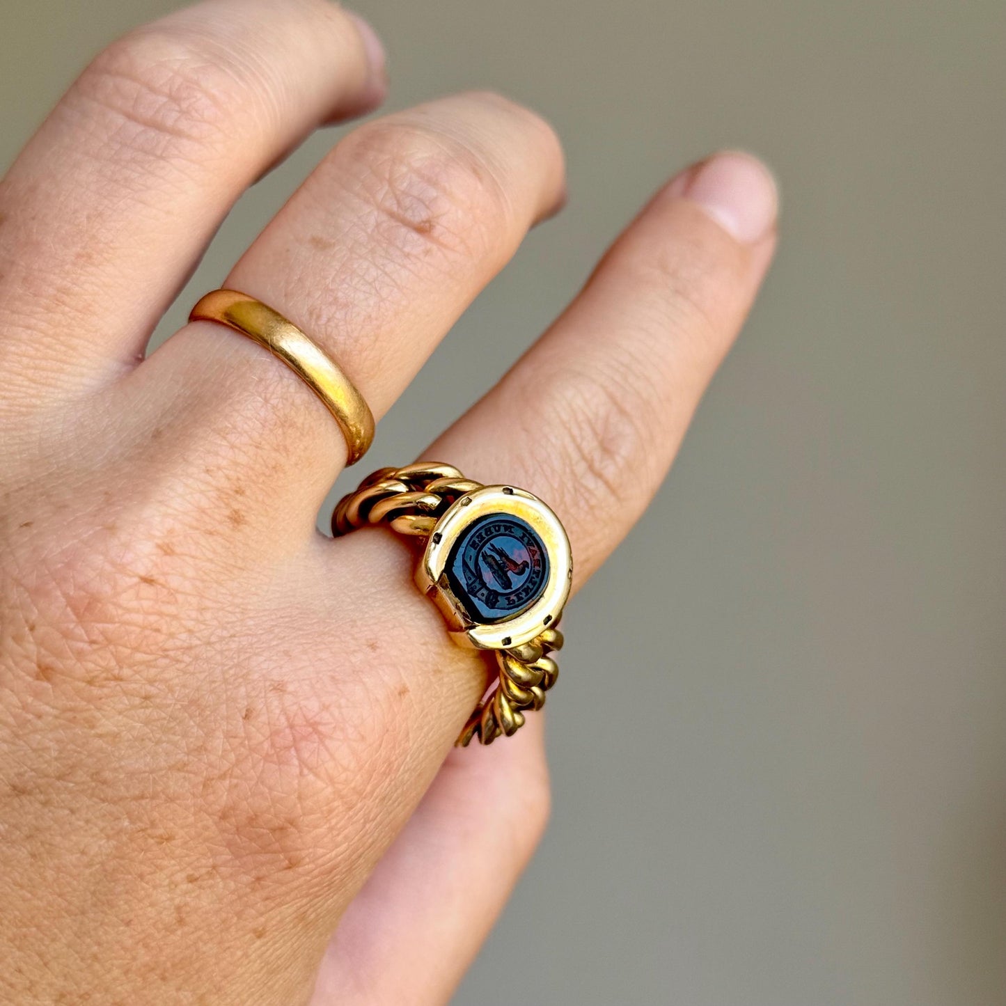Antique Intaglio Horseshoe Chain ring in 18 Carat Gold; Circa 1880