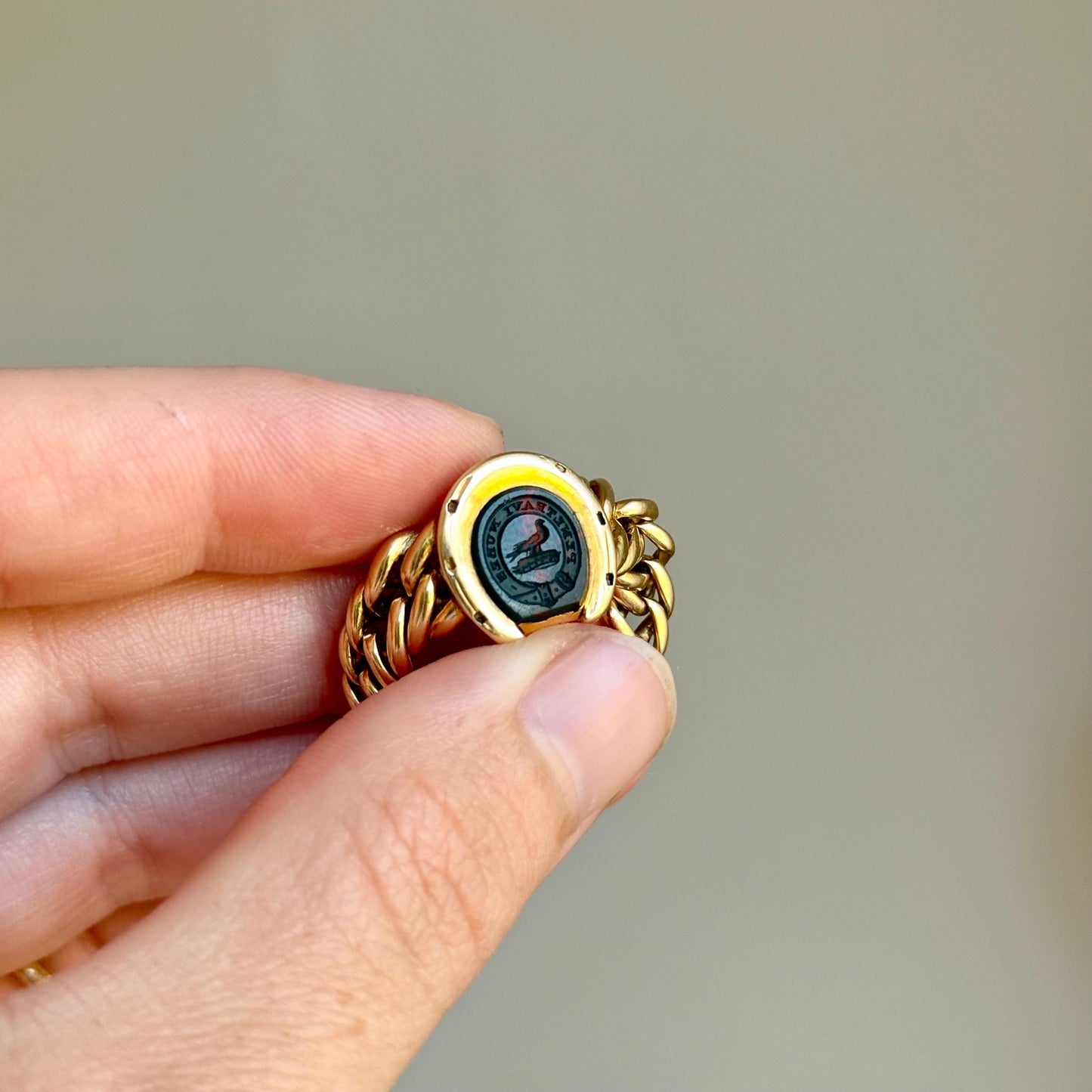 Antique Intaglio Horseshoe Chain ring in 18 Carat Gold; Circa 1880