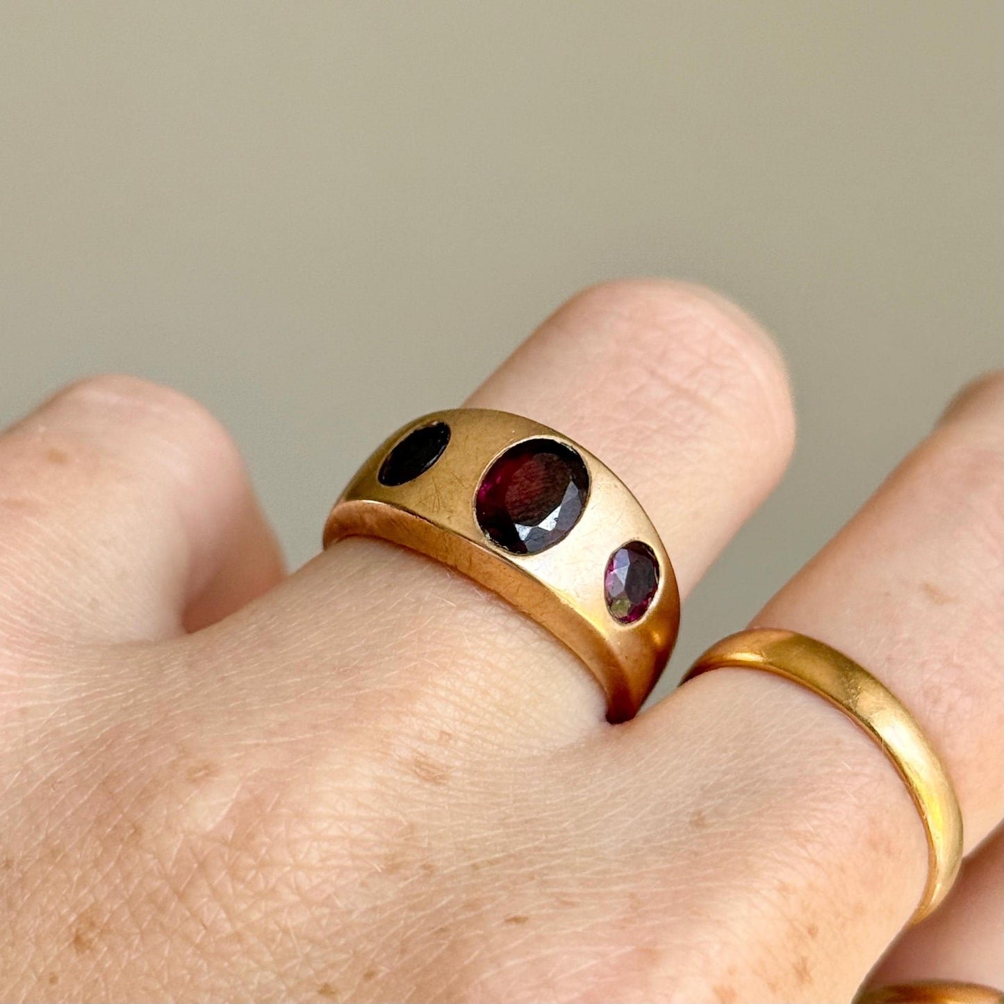 Antique Garnet Trilogy in 9 Carat Rose Gold Ring; Circa 1898
