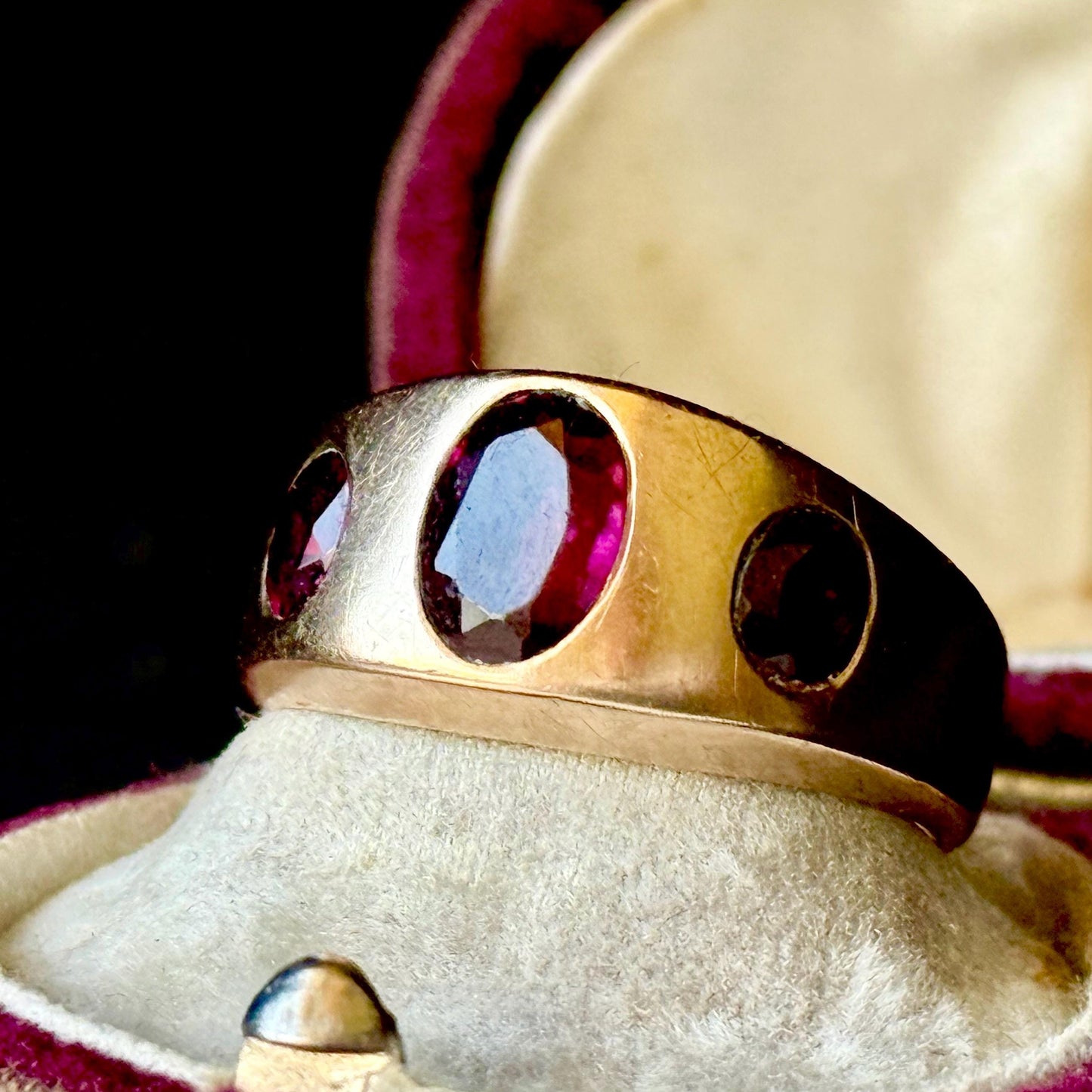 Antique Garnet Trilogy in 9 Carat Rose Gold Ring; Circa 1898