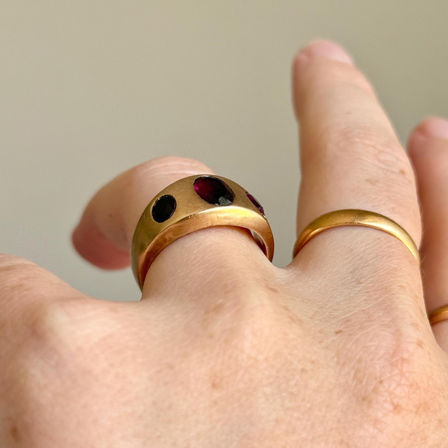 Antique Garnet Trilogy in 9 Carat Rose Gold Ring; Circa 1898