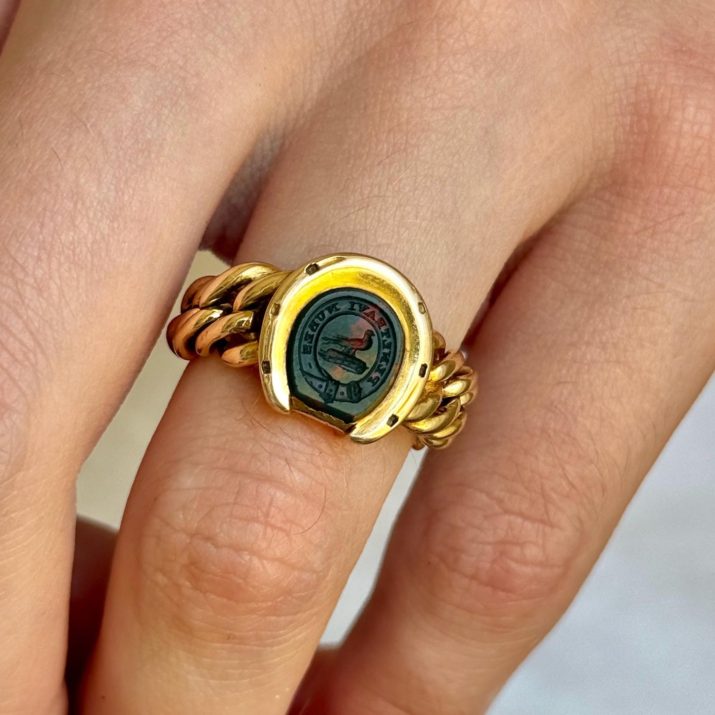 Antique Intaglio Horseshoe Chain ring in 18 Carat Gold; Circa 1880