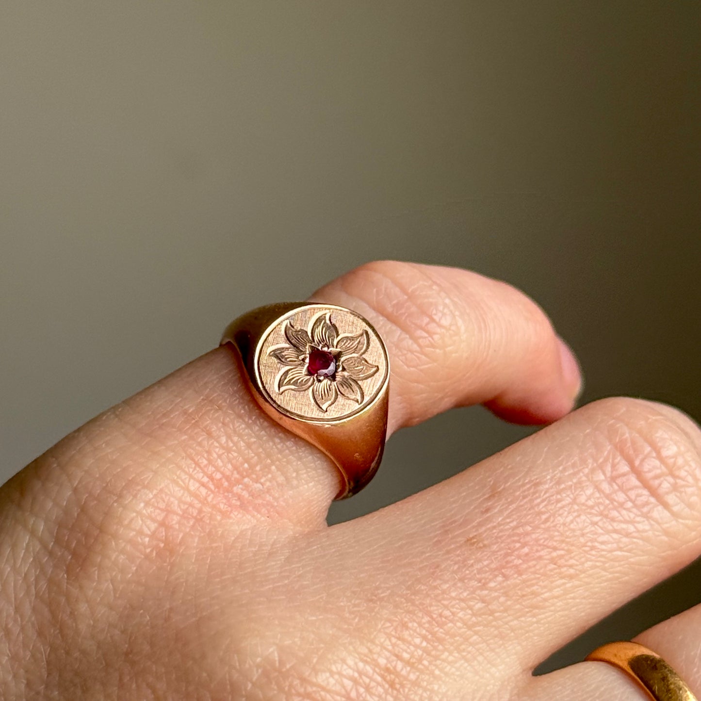 Antique Ruby Floral Signet Ring in 9 Carat Rose Gold; Circa 1919