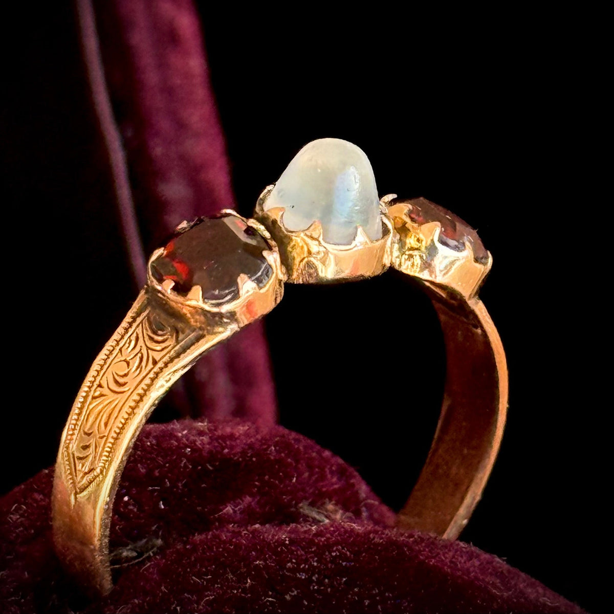 Moonstone & Garnet Ring in 15 Carat gold; Circa 1880