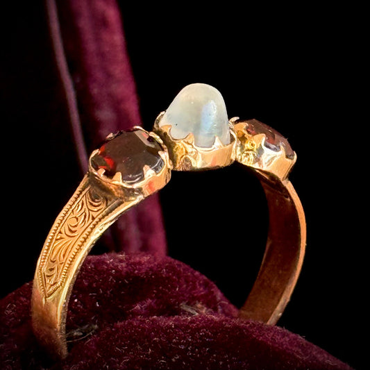 Moonstone & Garnet Ring in 15 Carat gold; Circa 1880