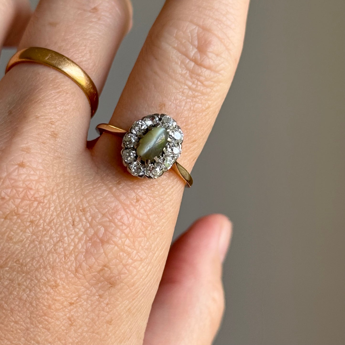 Antique Cat’s Eye Chrysoberyl & Diamond Halo Ring in 18 Carat Gold