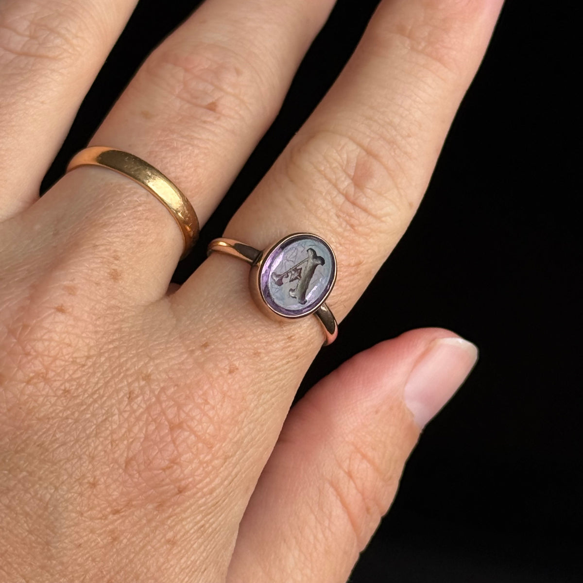 Antique Amethyst Intaglio 'A' Ring in 9 Carat Gold; Circa 1890