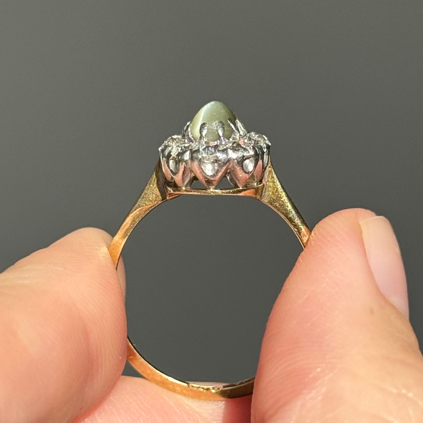 Antique Cat’s Eye Chrysoberyl & Diamond Halo Ring in 18 Carat Gold