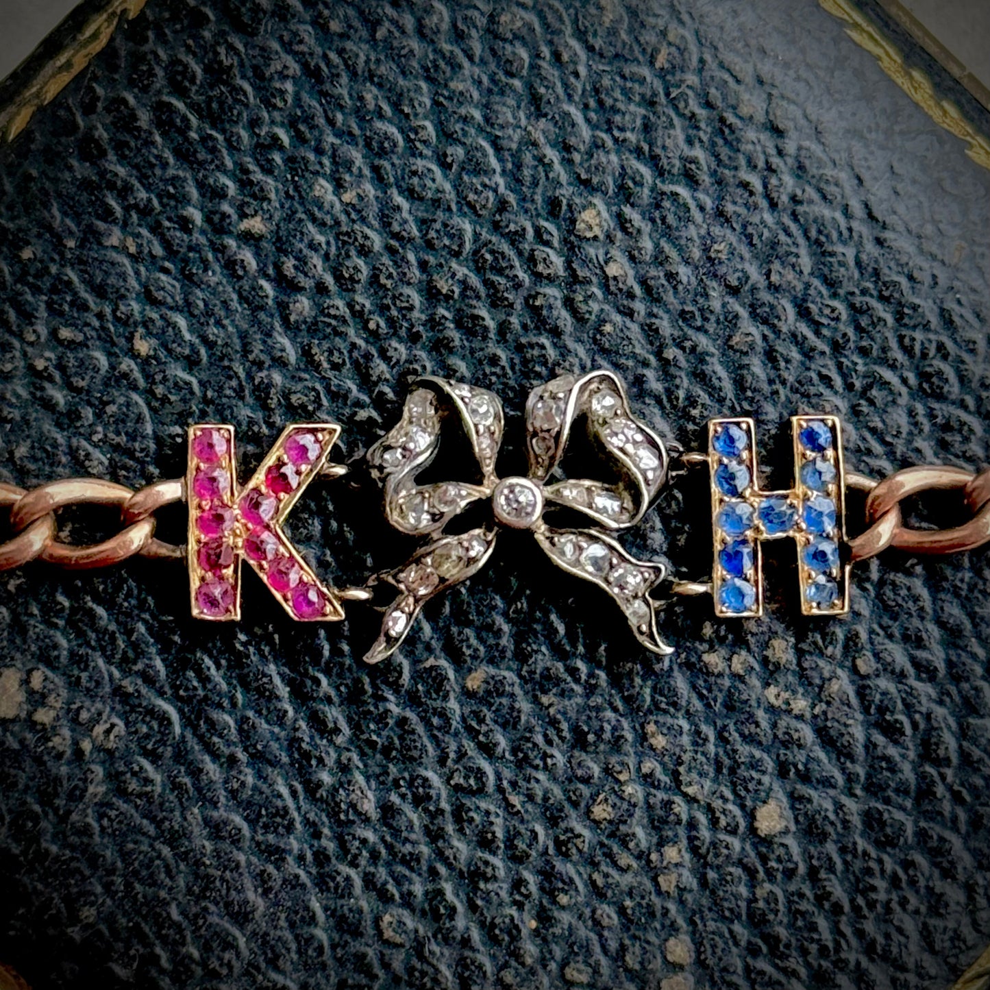 Antique 'K H' Diamond, Ruby & Sapphire Bracelet in 9 Carat Gold