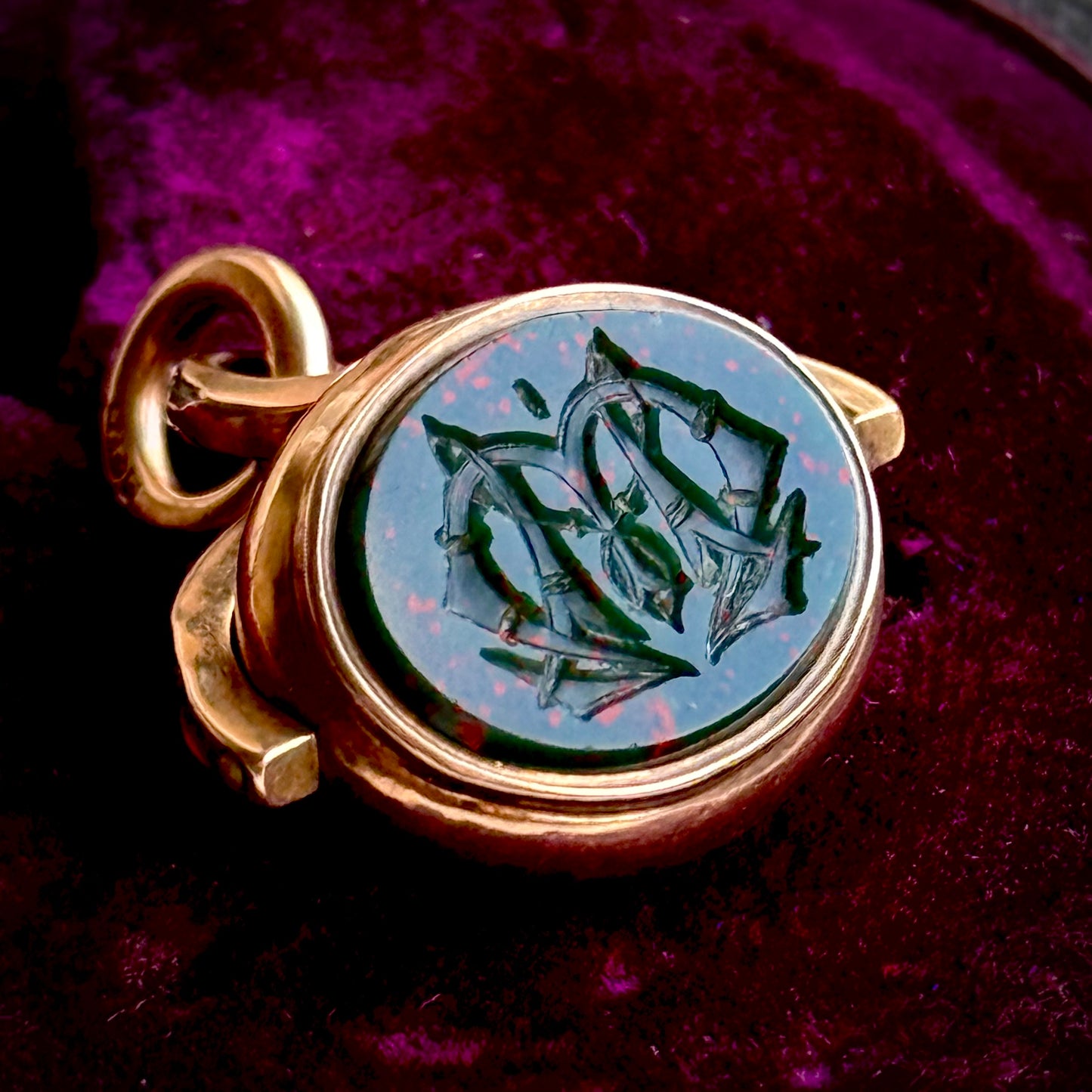 Antique Swivel Intaglio Dog  Pendant in 10 Carat Gold; Circa 1900