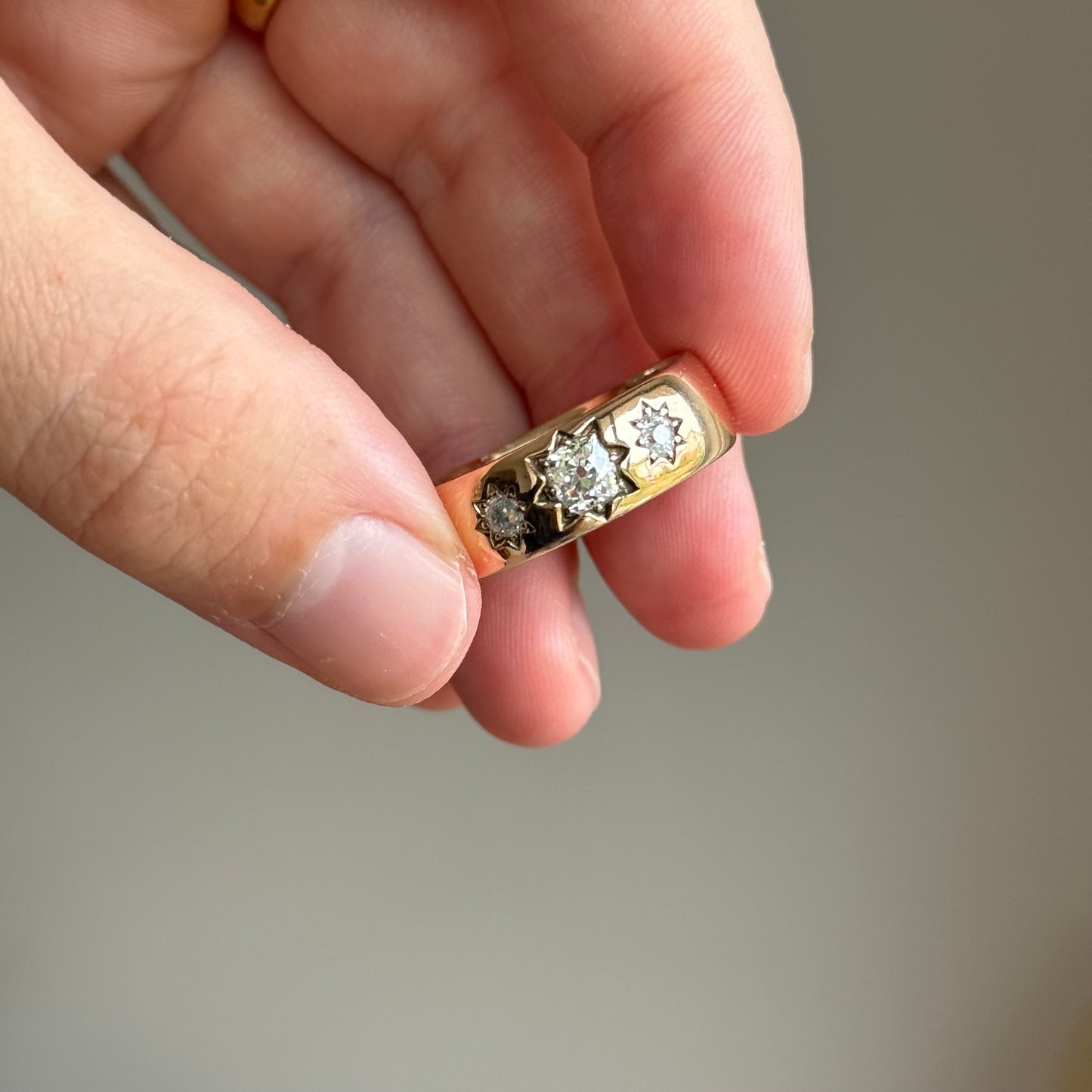 Antique Diamond Trilogy in 9 Carat Rose Gold Ring; Circa 1899