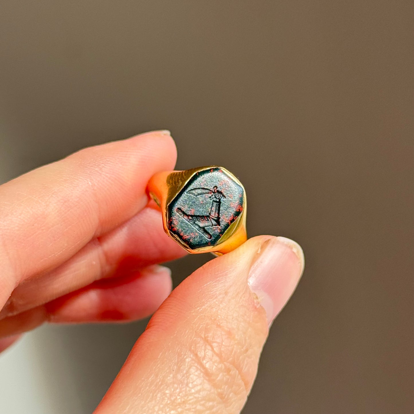 Antique Bloodstone Heraldic Signet Ring in 18 Carat Gold; Circa 1890