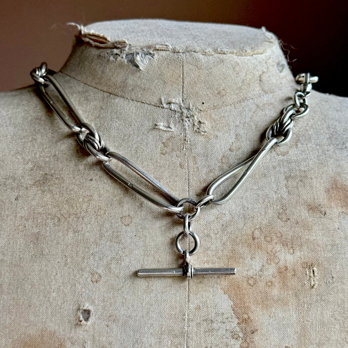 Victorian Heavy Trombone & Lover's Knot Chain in Silver; circa 1893