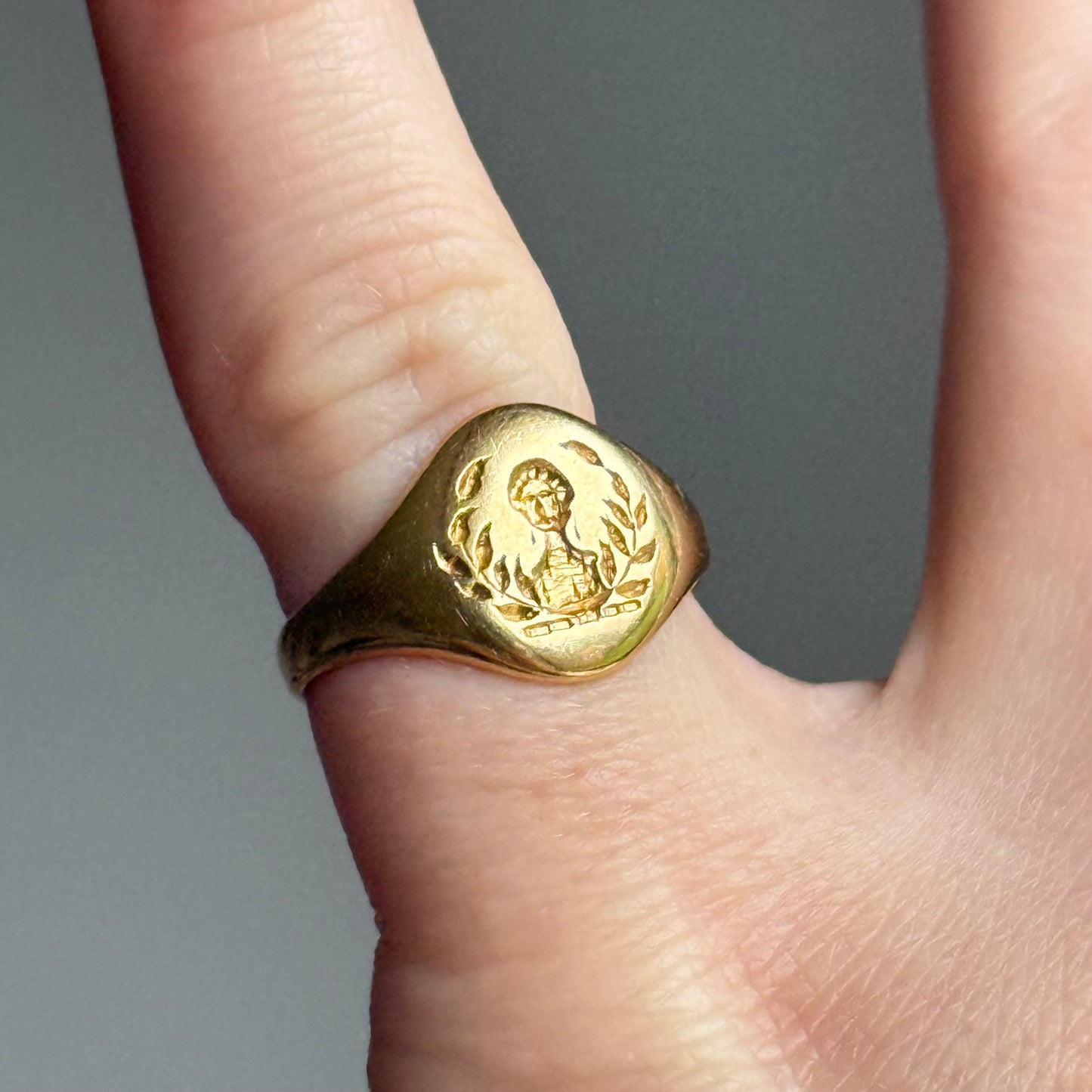 Antique Victorian Intaglio Heraldic Signet Ring in 18 Carat Gold; Circa 1890