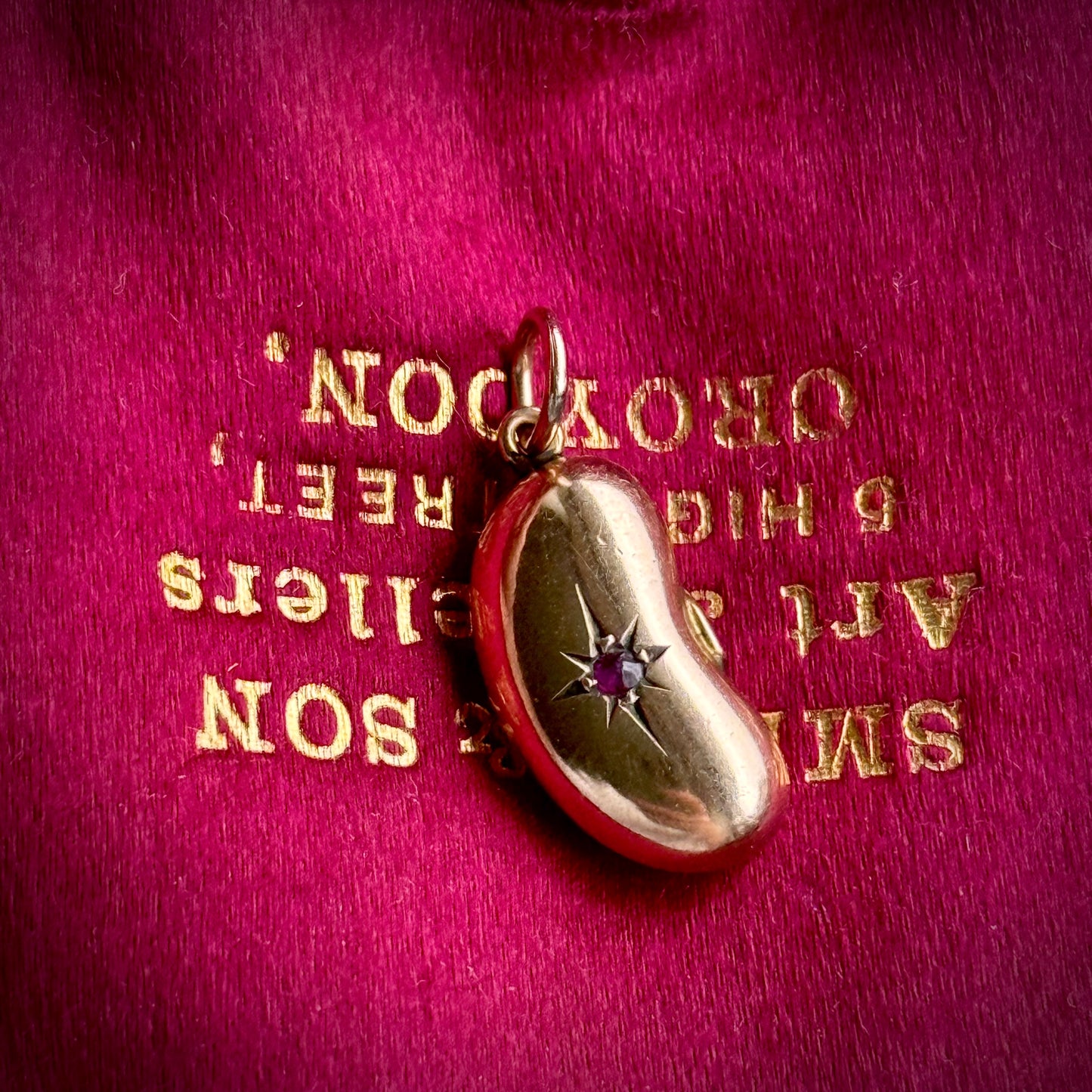 Victorian Lucky Ruby Kidney Bean Pendant 9 Carat Gold; Circa 1860