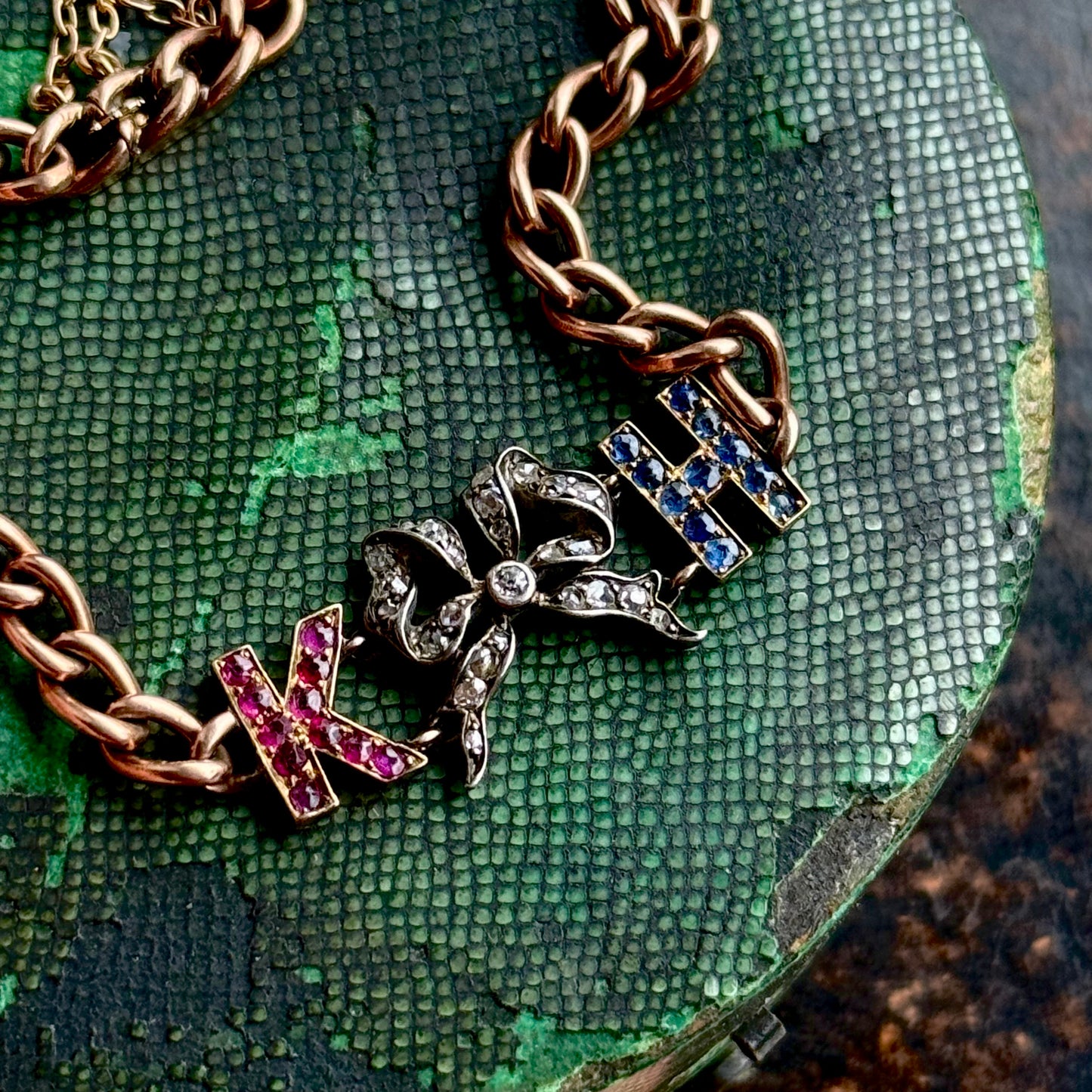 Antique 'K H' Diamond, Ruby & Sapphire Bracelet in 9 Carat Gold