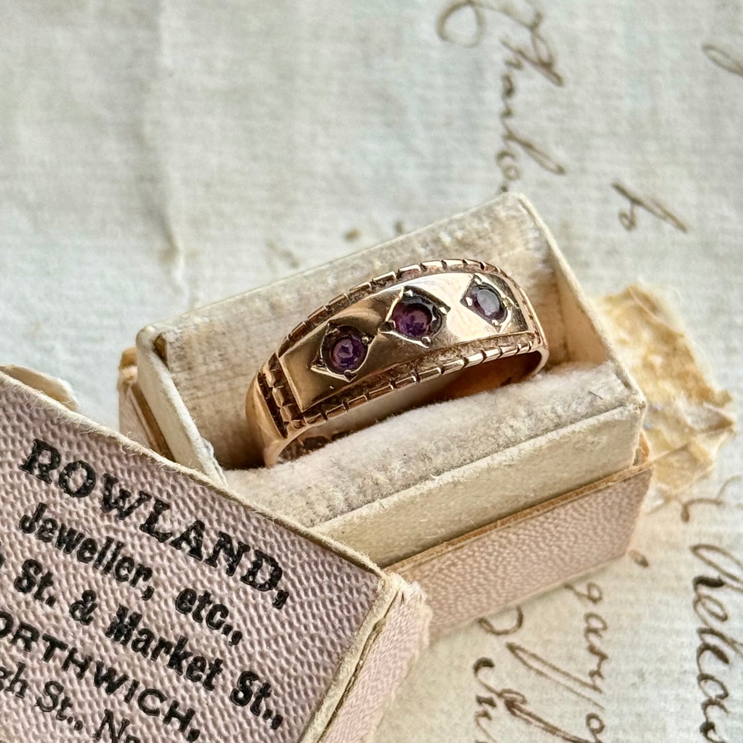 Victorian Amethyst Trilogy Ring in 9 Carat Gold; Circa 1896