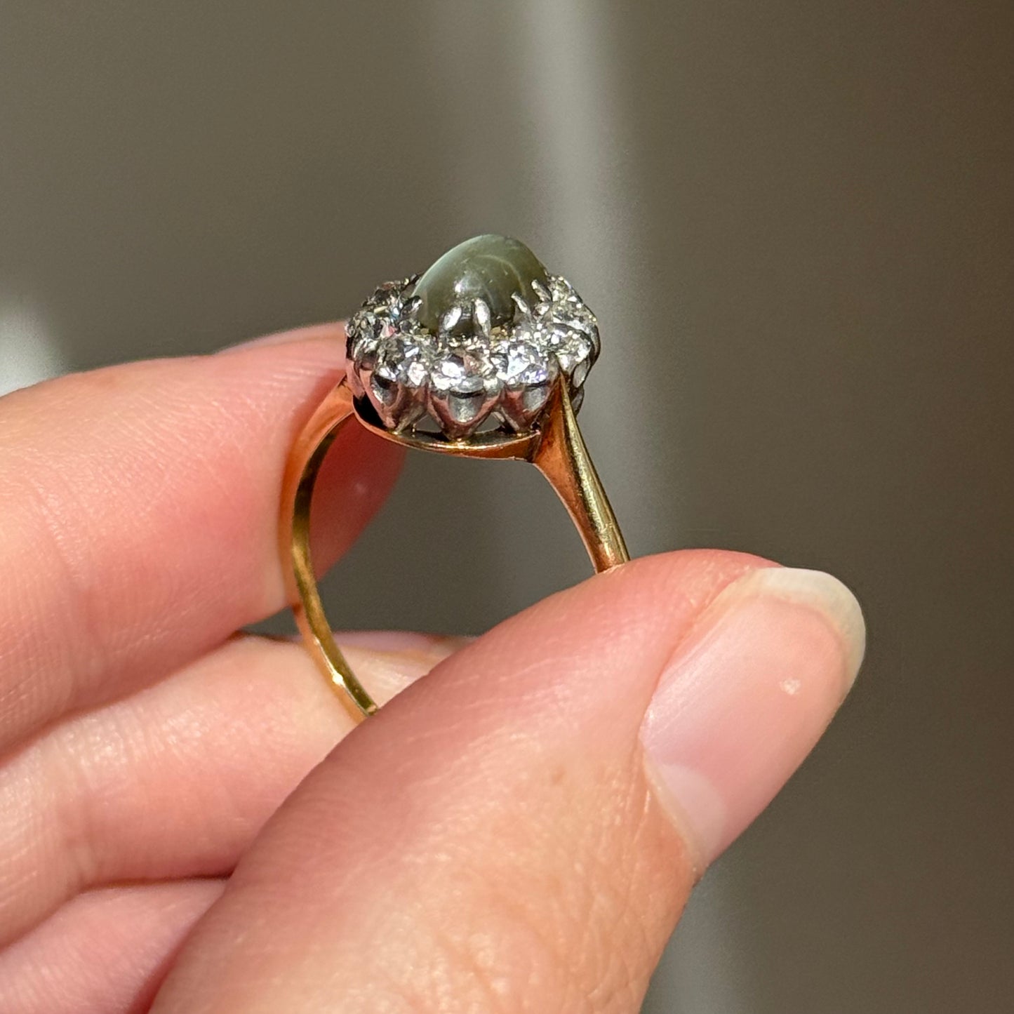 Antique Cat’s Eye Chrysoberyl & Diamond Halo Ring in 18 Carat Gold