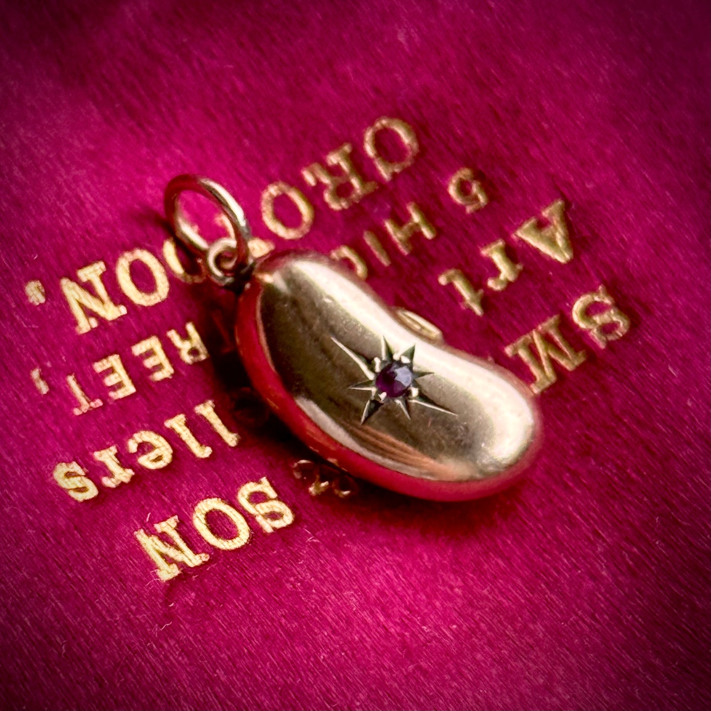 Victorian Lucky Ruby Kidney Bean Pendant 9 Carat Gold; Circa 1860