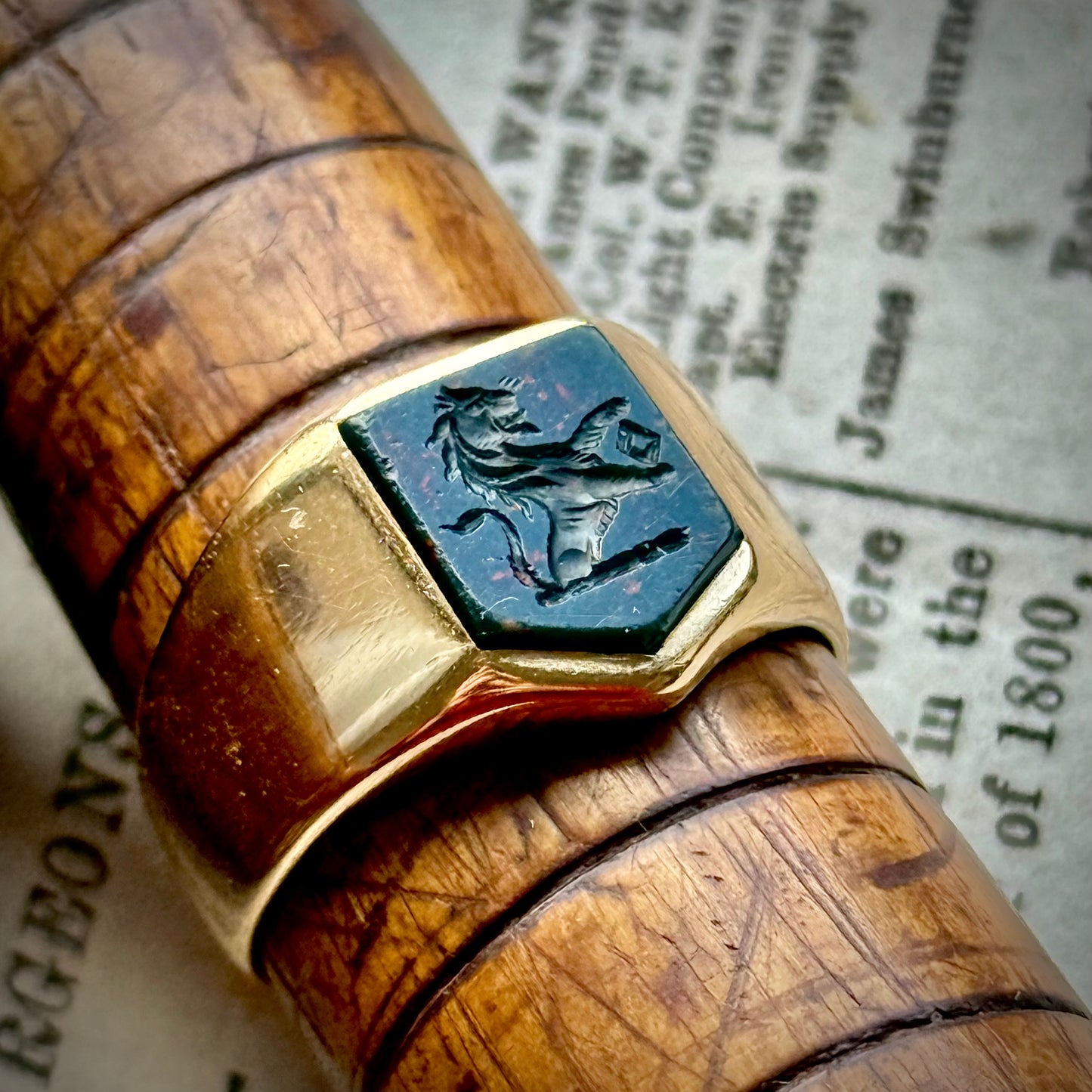 Antique Bloodstone Lion Signet Ring in 18 Carat Gold; Circa 1880