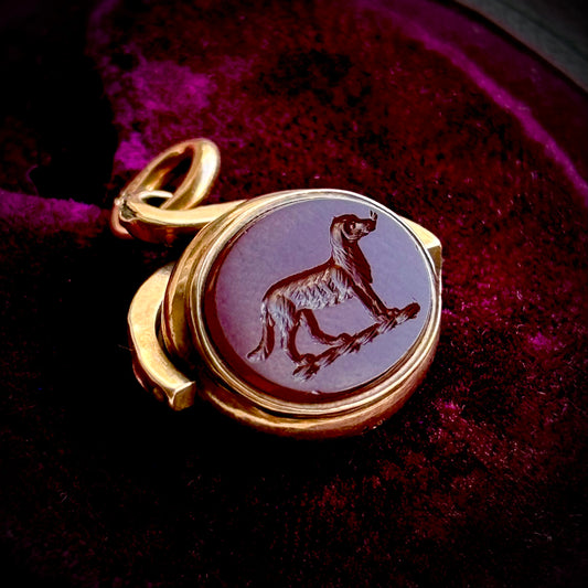 Antique Swivel Intaglio Dog  Pendant in 10 Carat Gold; Circa 1900