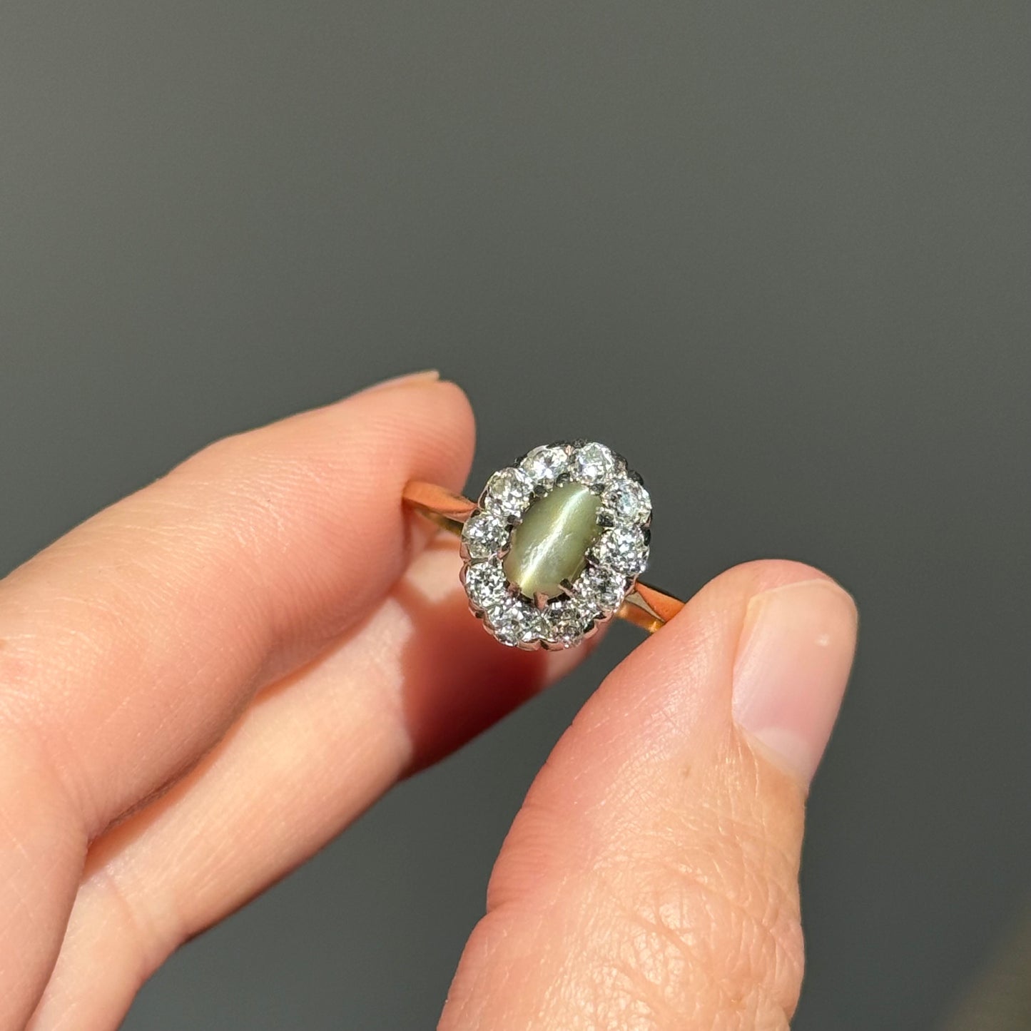 Antique Cat’s Eye Chrysoberyl & Diamond Halo Ring in 18 Carat Gold