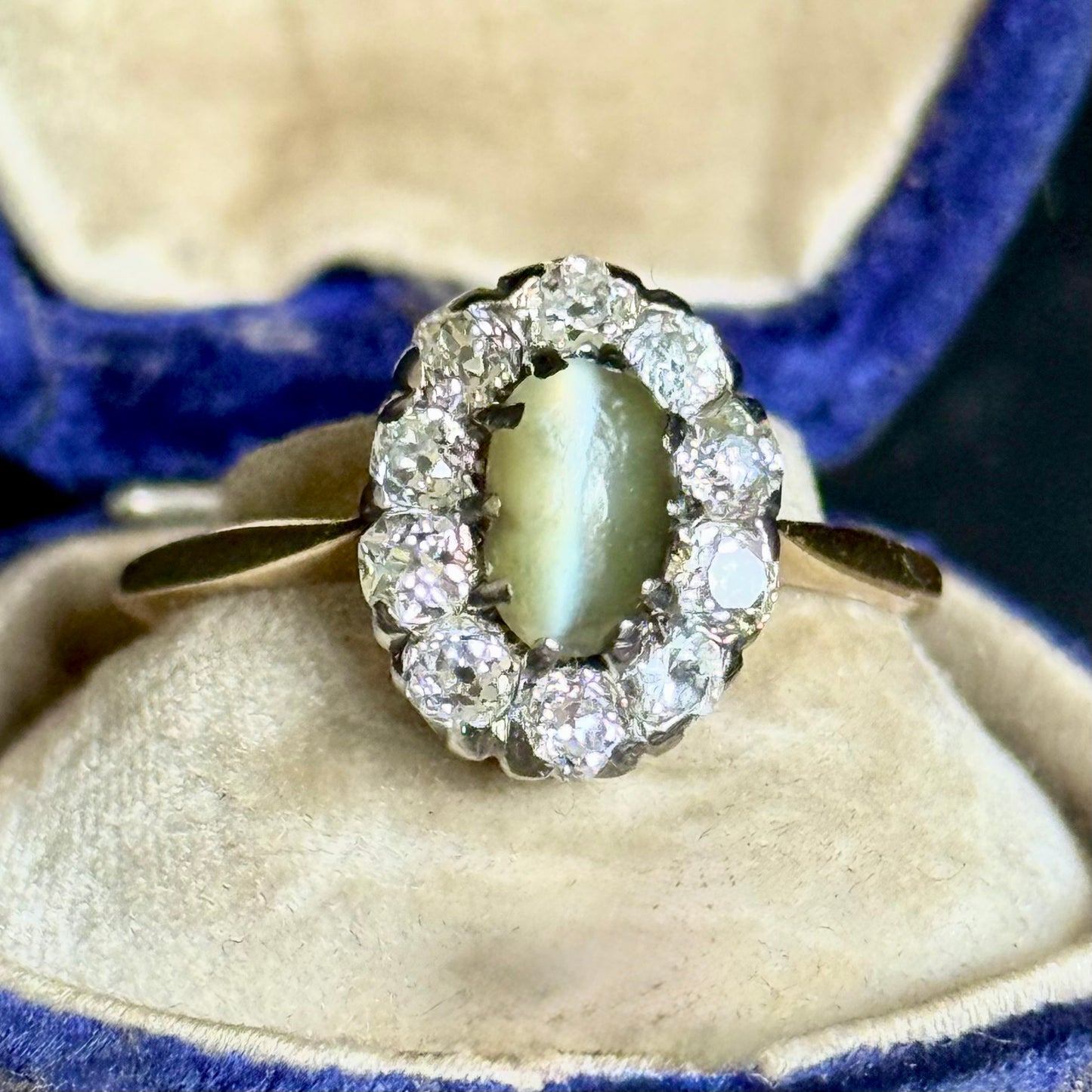 Antique Cat’s Eye Chrysoberyl & Diamond Halo Ring in 18 Carat Gold